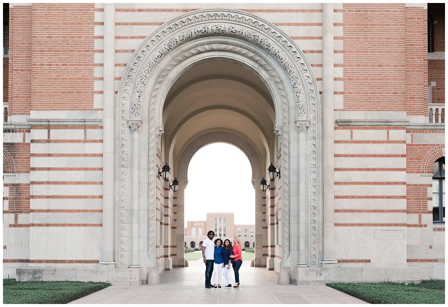 a family poses during their fall mini session at Rice University in Houston Texas by Swish and Click Photography