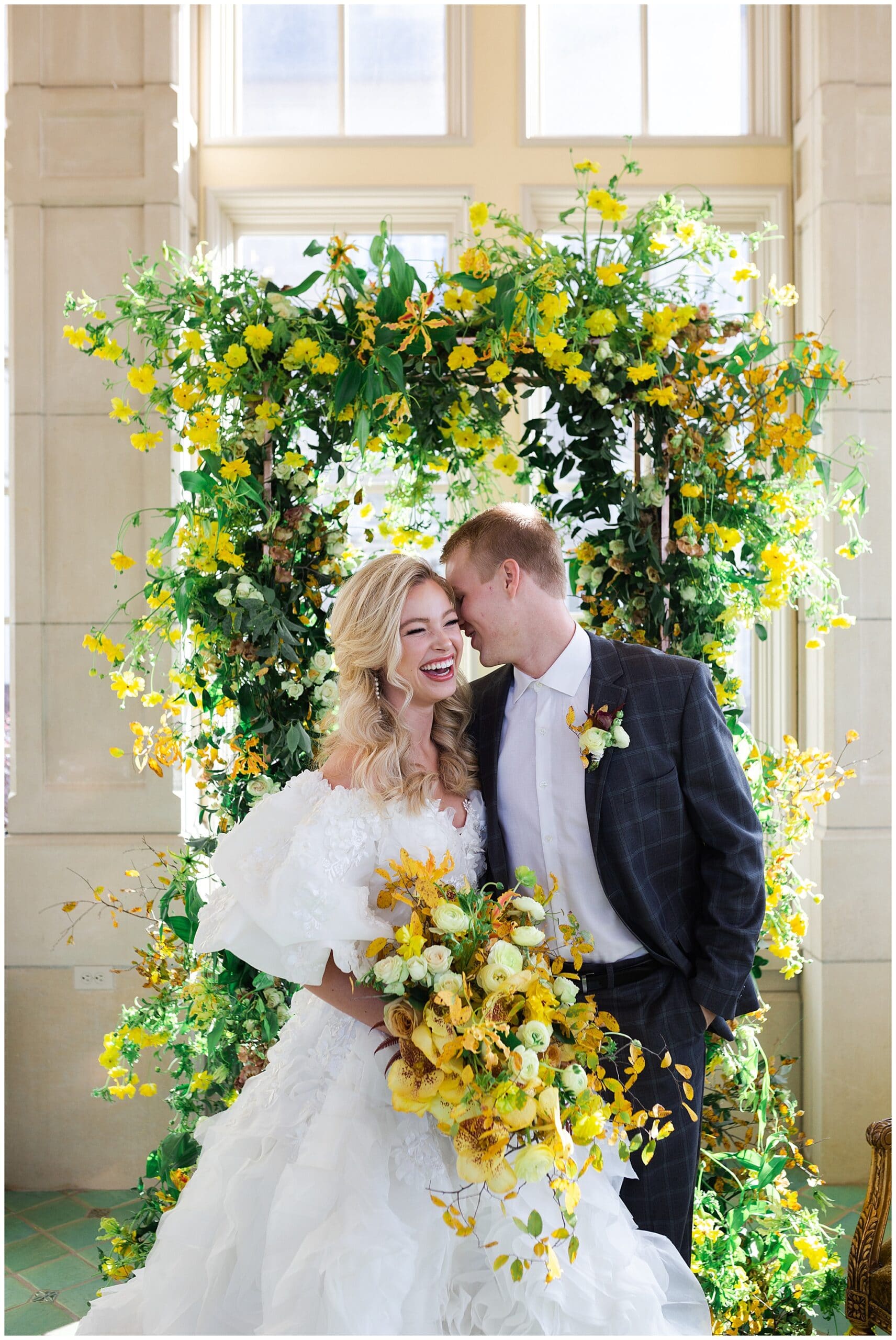 bride and groom kiss on wedding day at The Olana in Hickory Creek, Texas in a yellow themed wedding captured by Swish and Click Photography