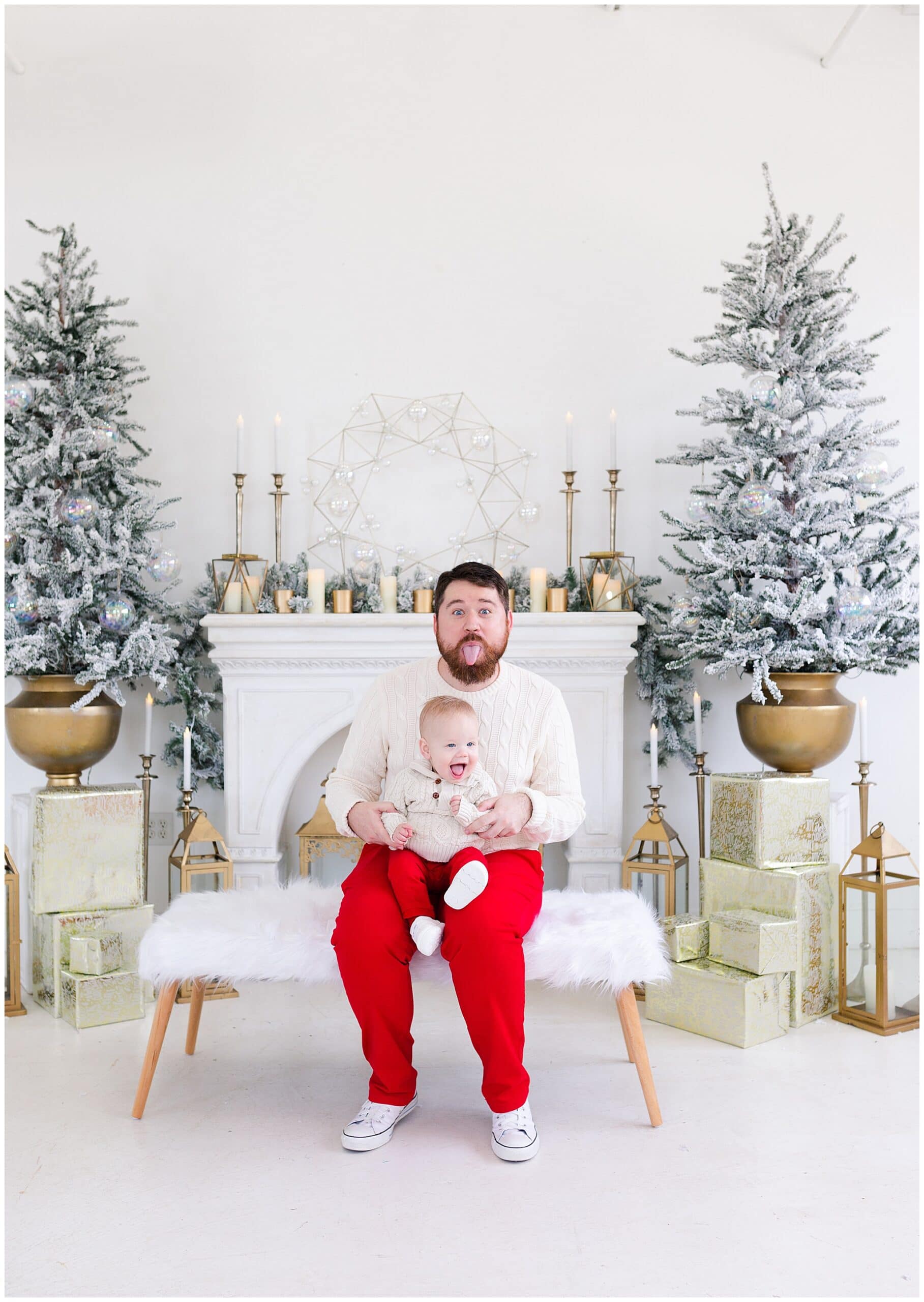 father and baby at a Christmas portraits session at Studio HTX in Houston Texas by Swish and Click Photography