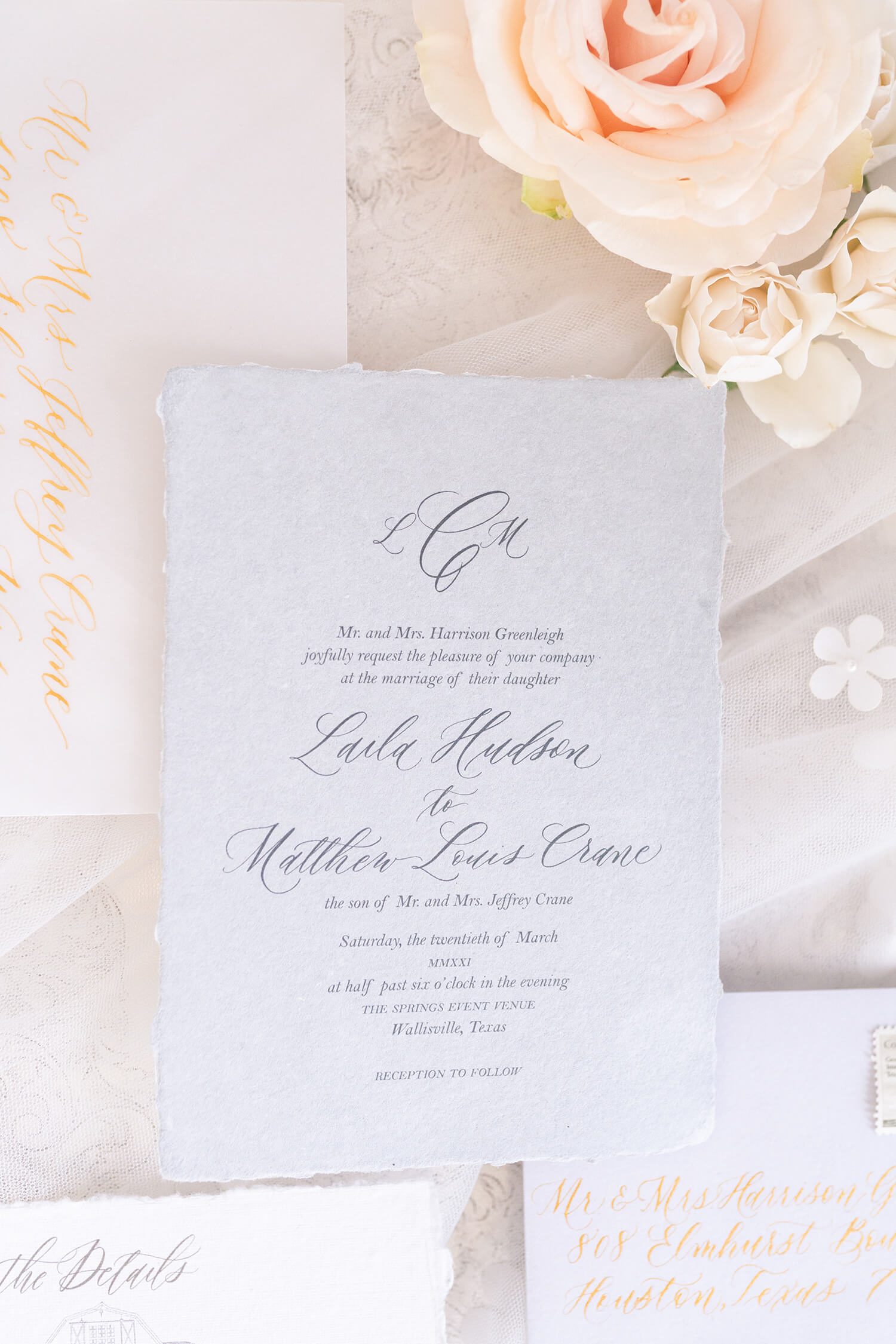 cursive wedding invitation with flowers it Wallisville Springs wedding venue in Houston Texas by Swish and Click Photography Hiring a wedding photographer