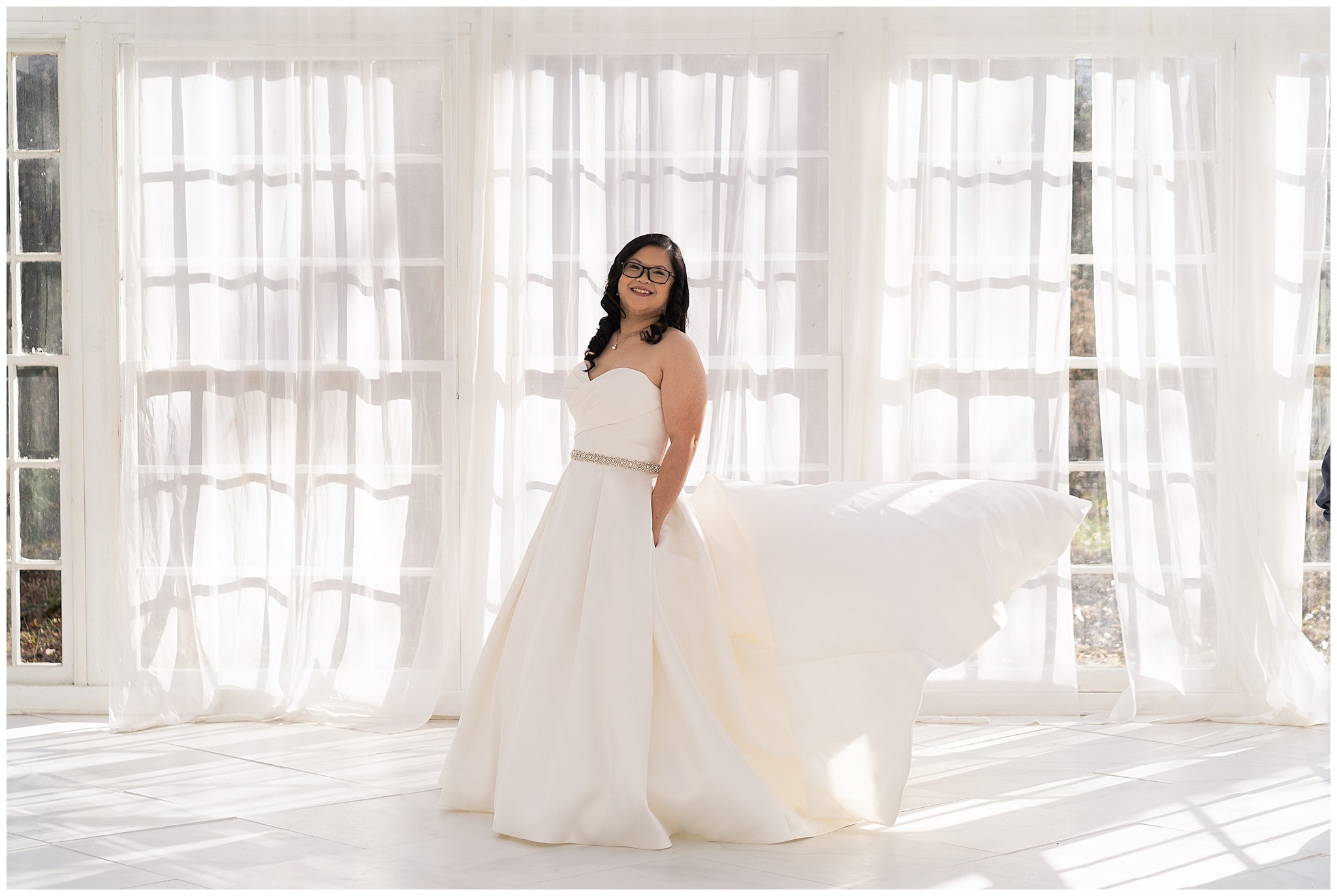 bride posing for her bridal portraits at the Oak Atelier by Swish and Click Photography