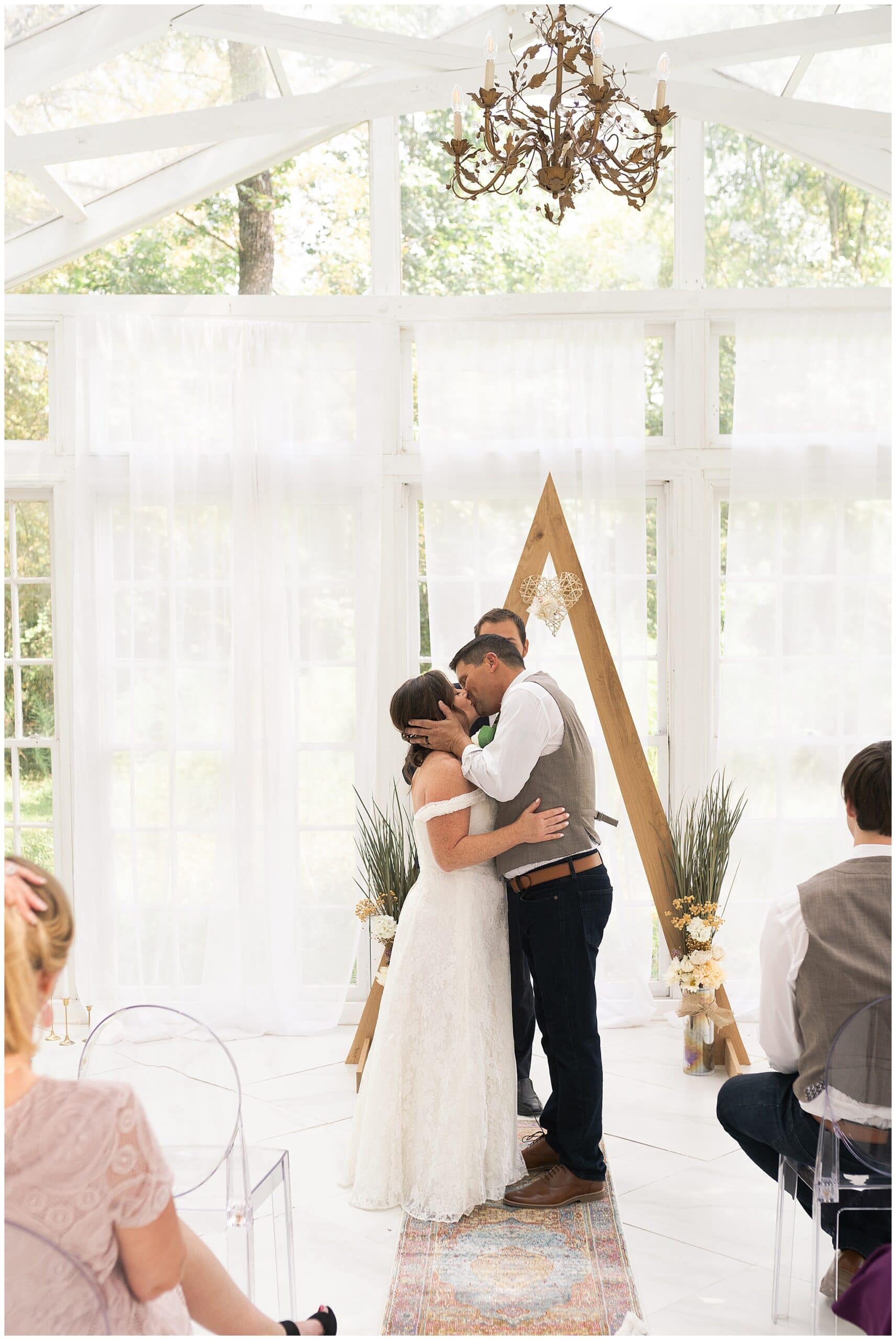 Oak Atelier elopement first kiss captured by Swish and Click Photography in Houston Texas