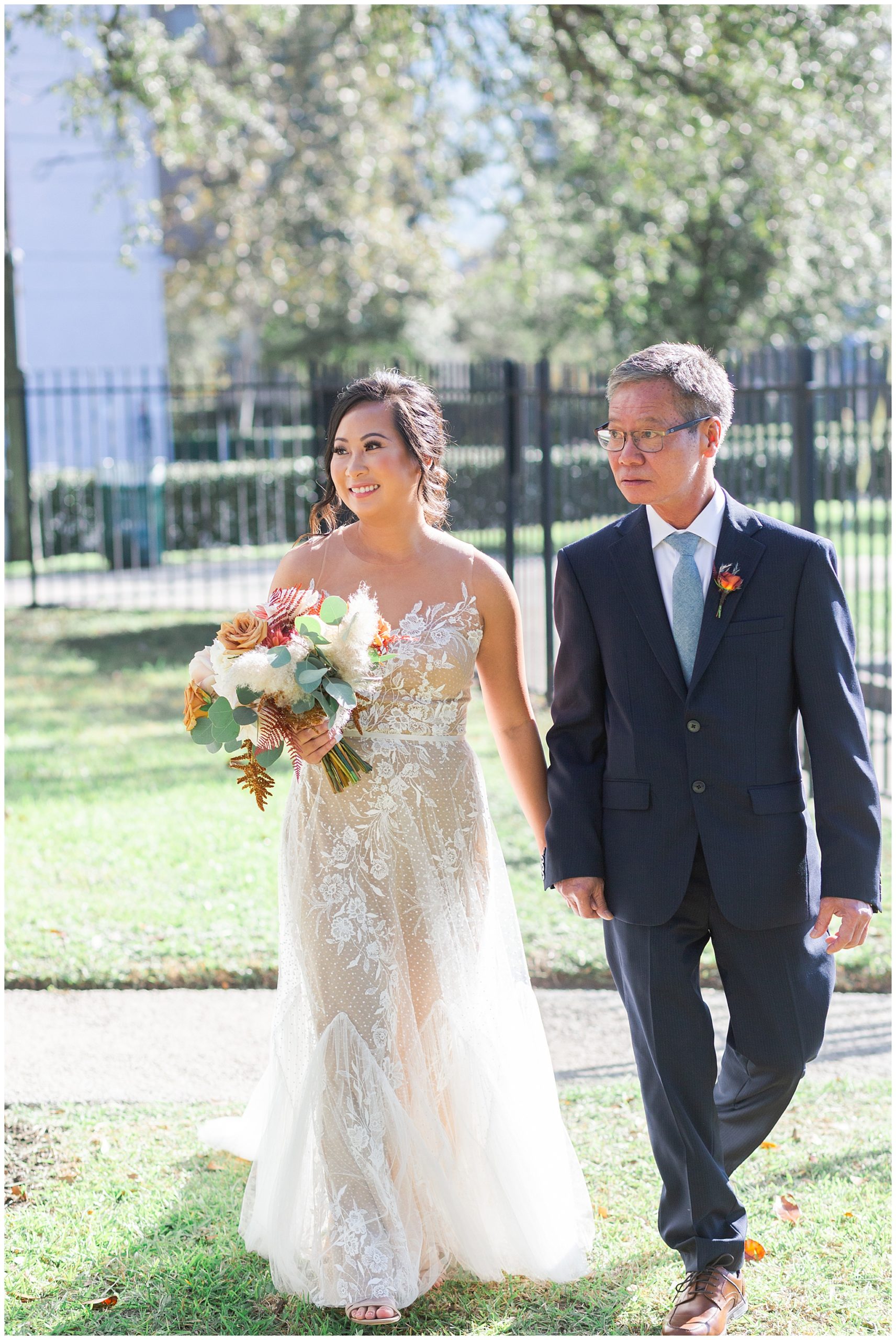 bride walks down the aisle at Houston wedding at the Heritage Society by Swish and Click Photography