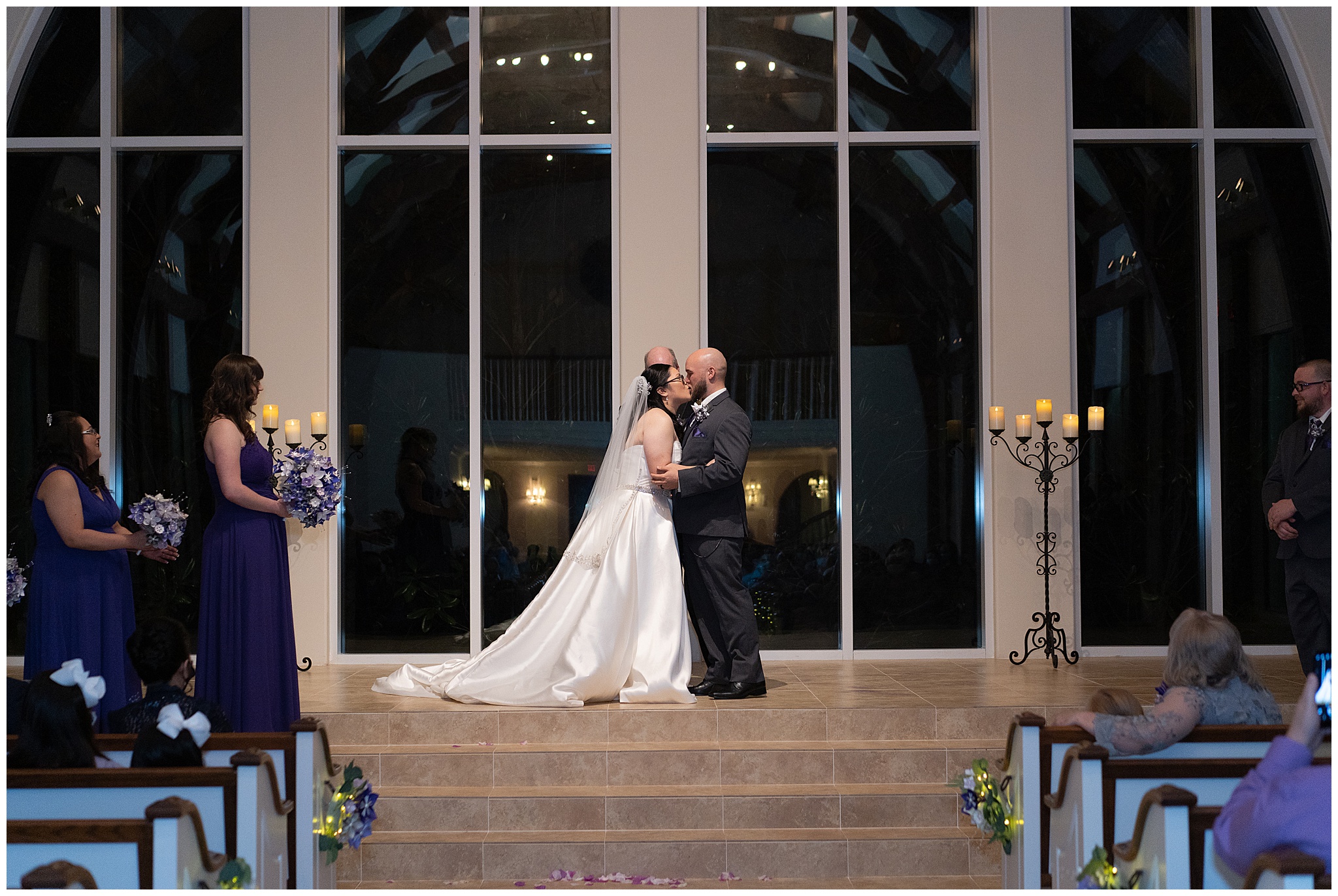 first kiss with bride and groom at Ashton Gardens in Houston Texas by Swish and Click Photography