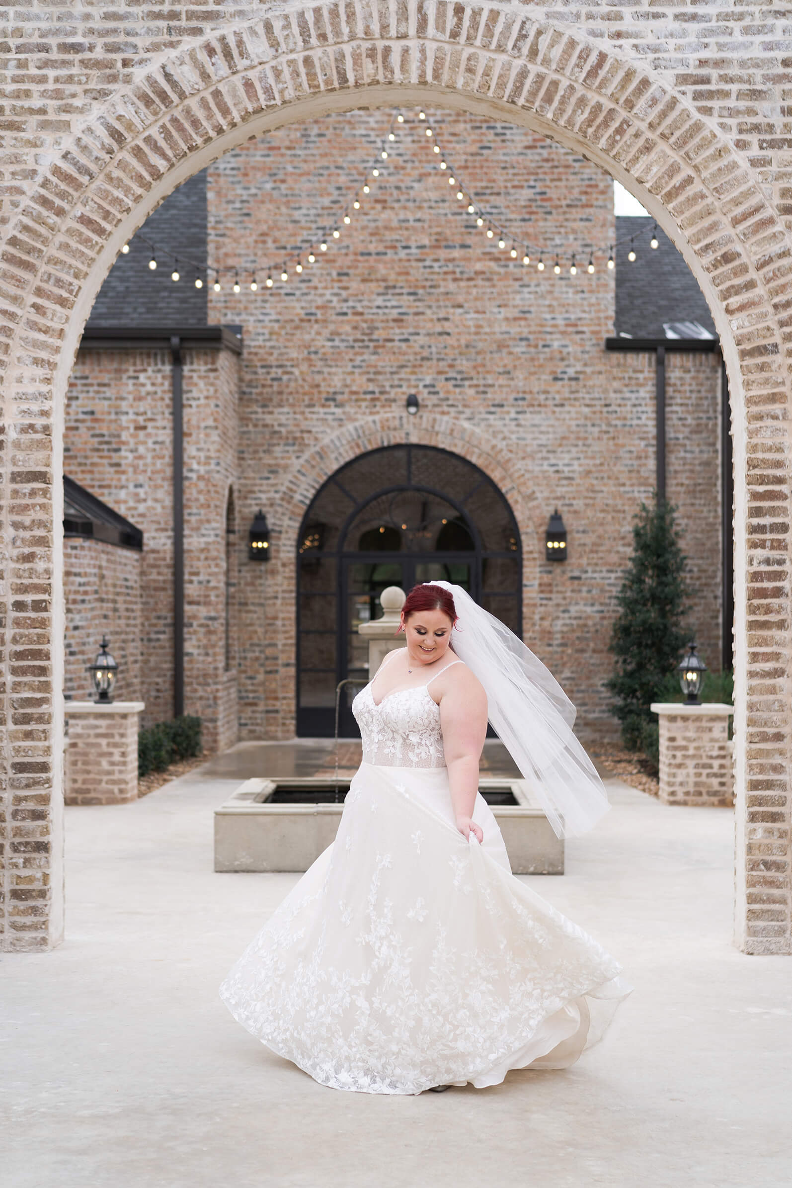 bride poses during her bridal session at Iron Manor by Swish and Click Photography