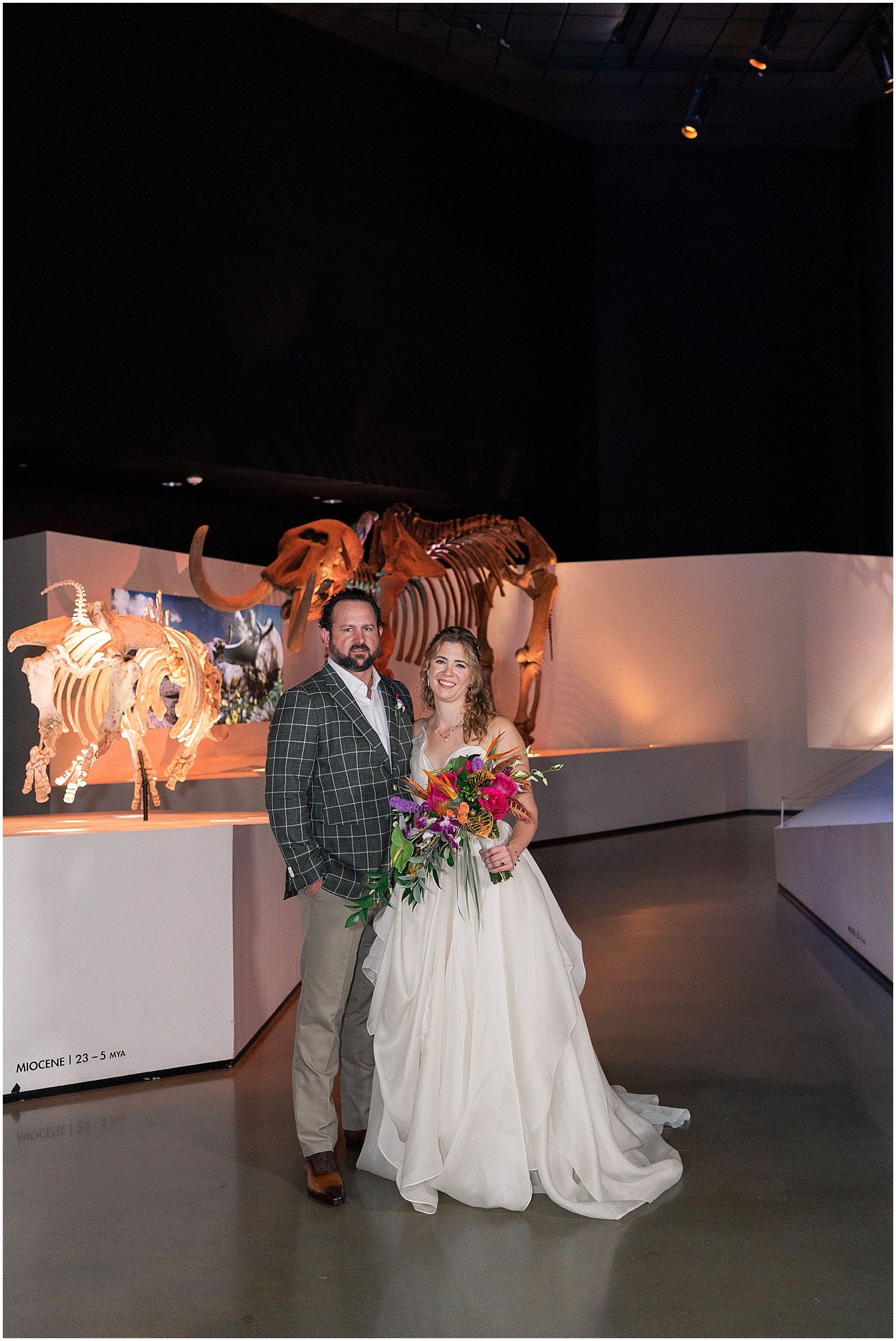 Newlywed portraits with Dinosaurs at The Houston Museum of Natural Science | Swish and Click Photography - Houston Wedding Photographer