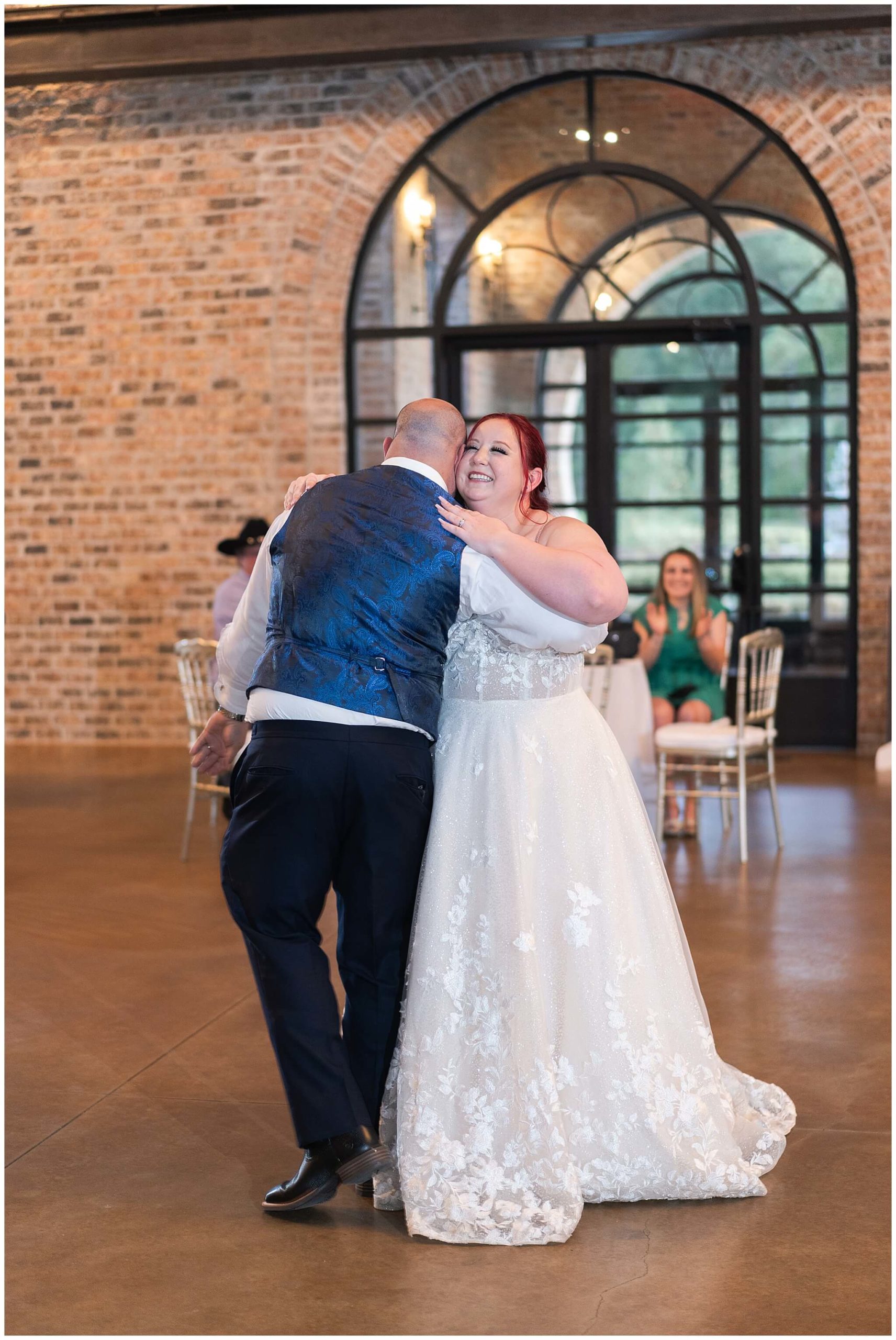 bride and groom share a first dance on thier wedding day at Iron Manor in Houston Texas by Swish and Click Photography