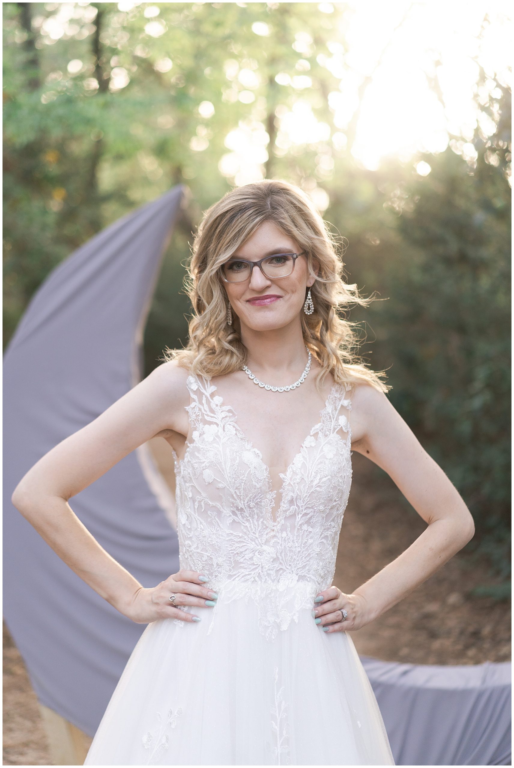 bride smiles in her wedding gown at a Houston park