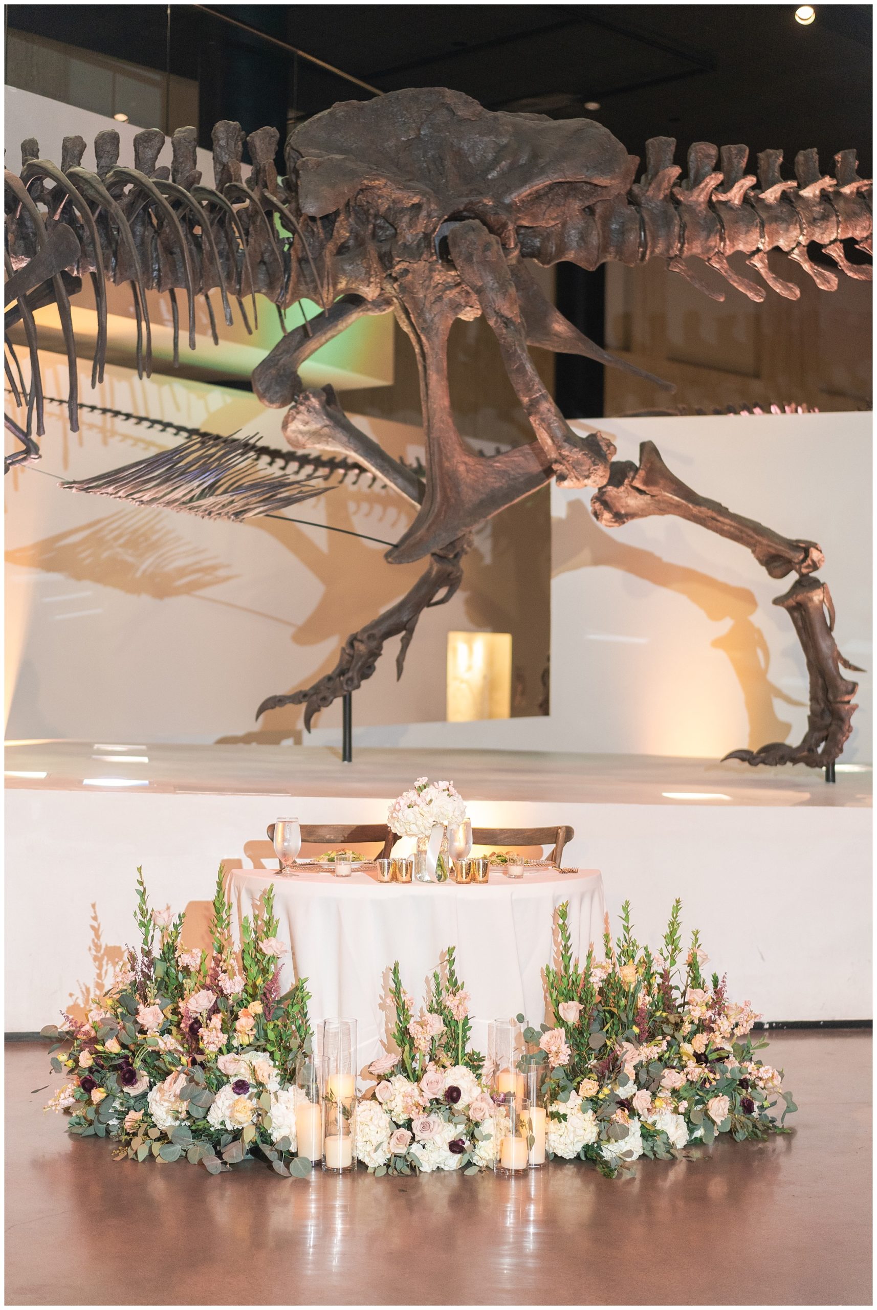 wedding sweetheart table at houston museum of natural science by Houston's best wedding photographers Swish and Click Photography