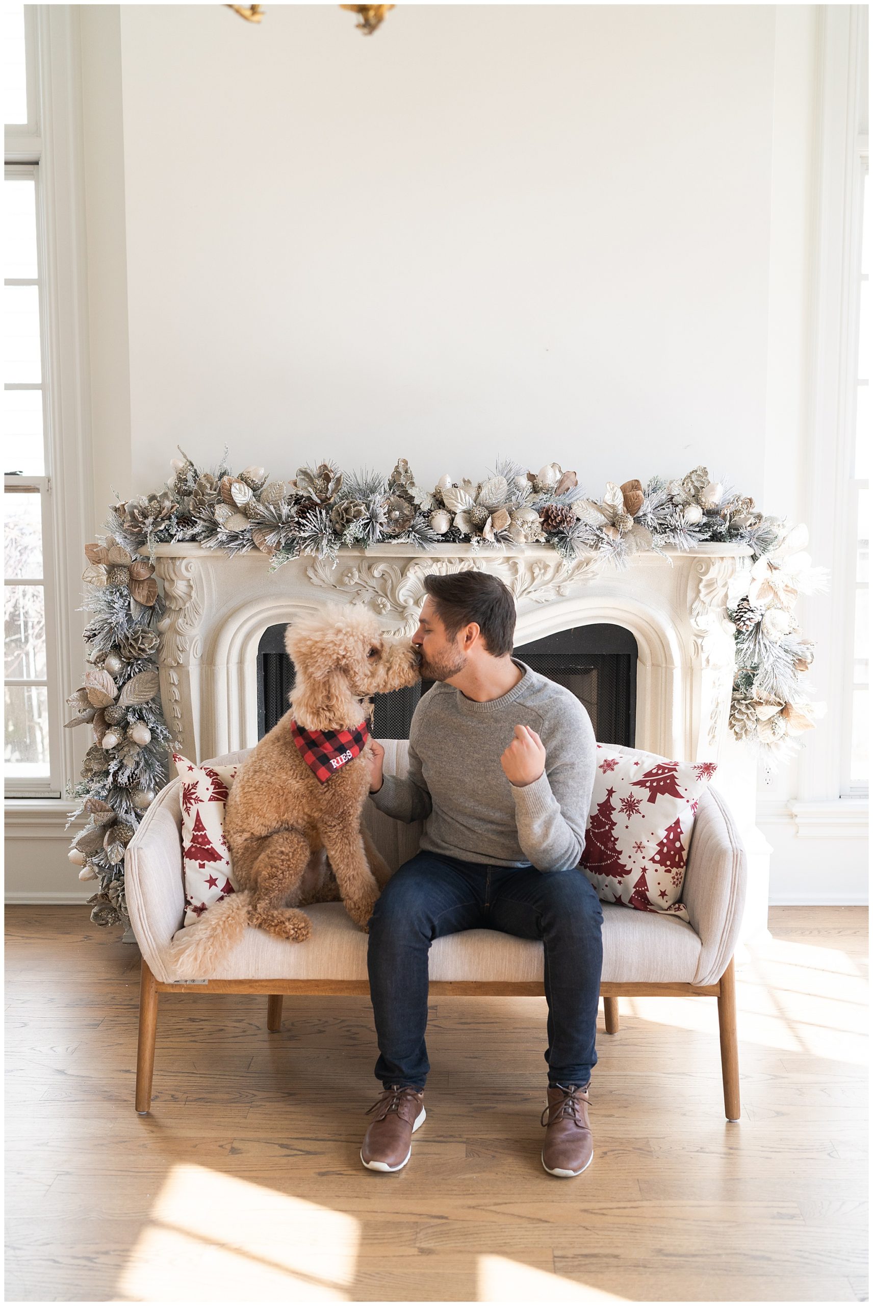 dad and dog sit and kiss for photos at the Creative Chateau in Houston Texas by photographer Swish and Click Photography
