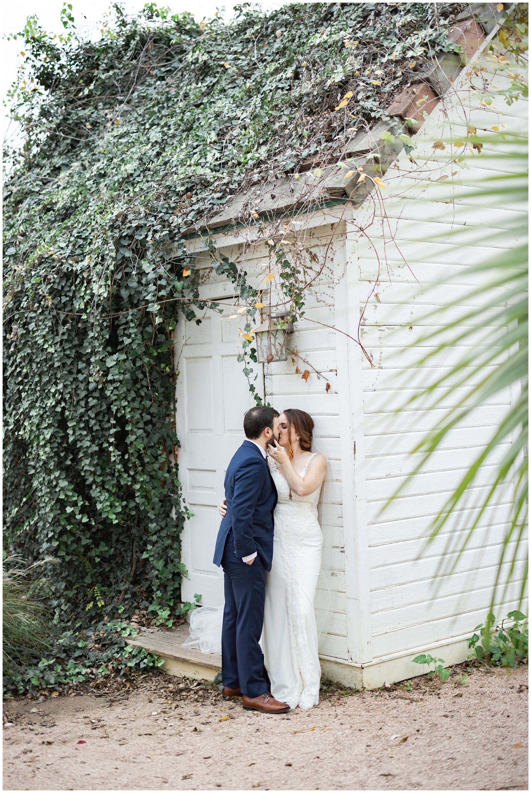 bride and groom at barr mansion by Houston's best wedding photographers Swish and Click Photography