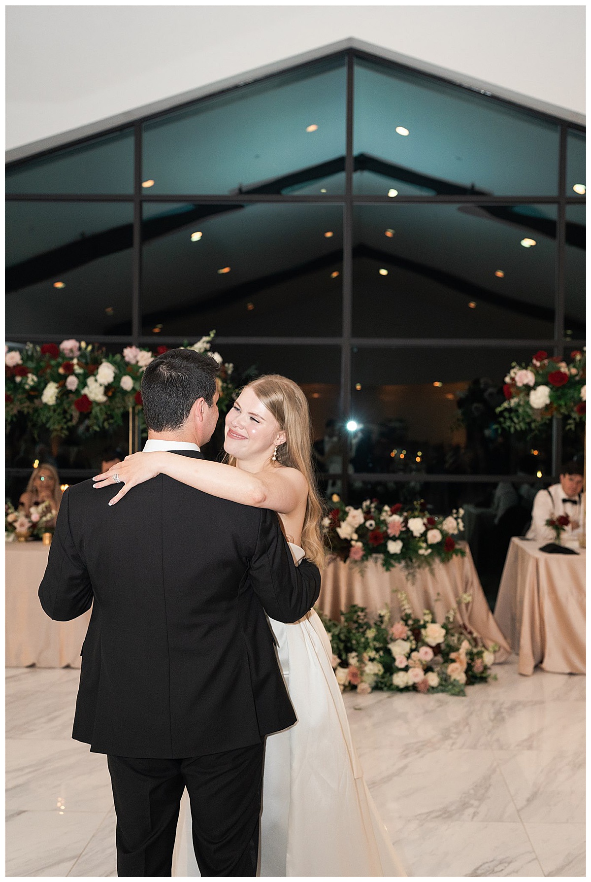 Woman smiles big at husband for Houston’s Best Wedding Photographers