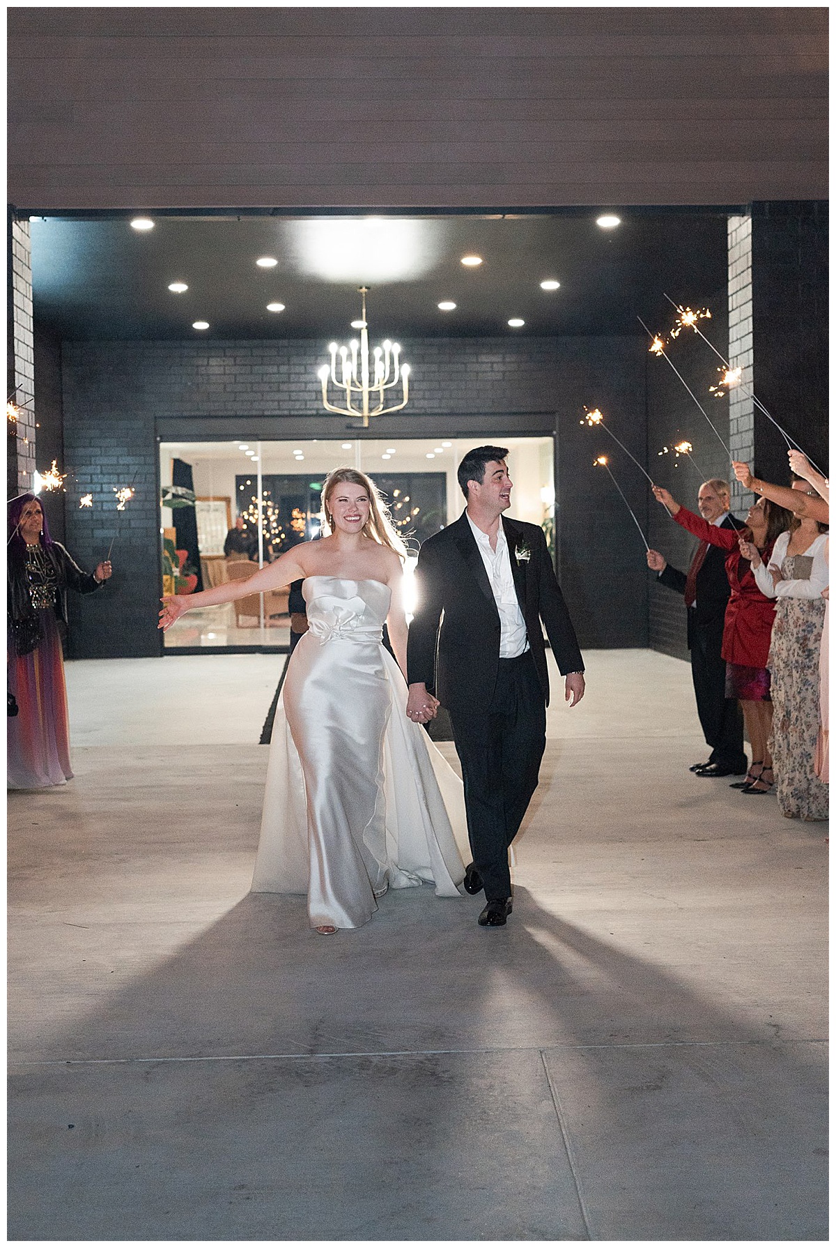 Bride and groom exit their wedding with sparklers for Houston’s Best Wedding Photographers