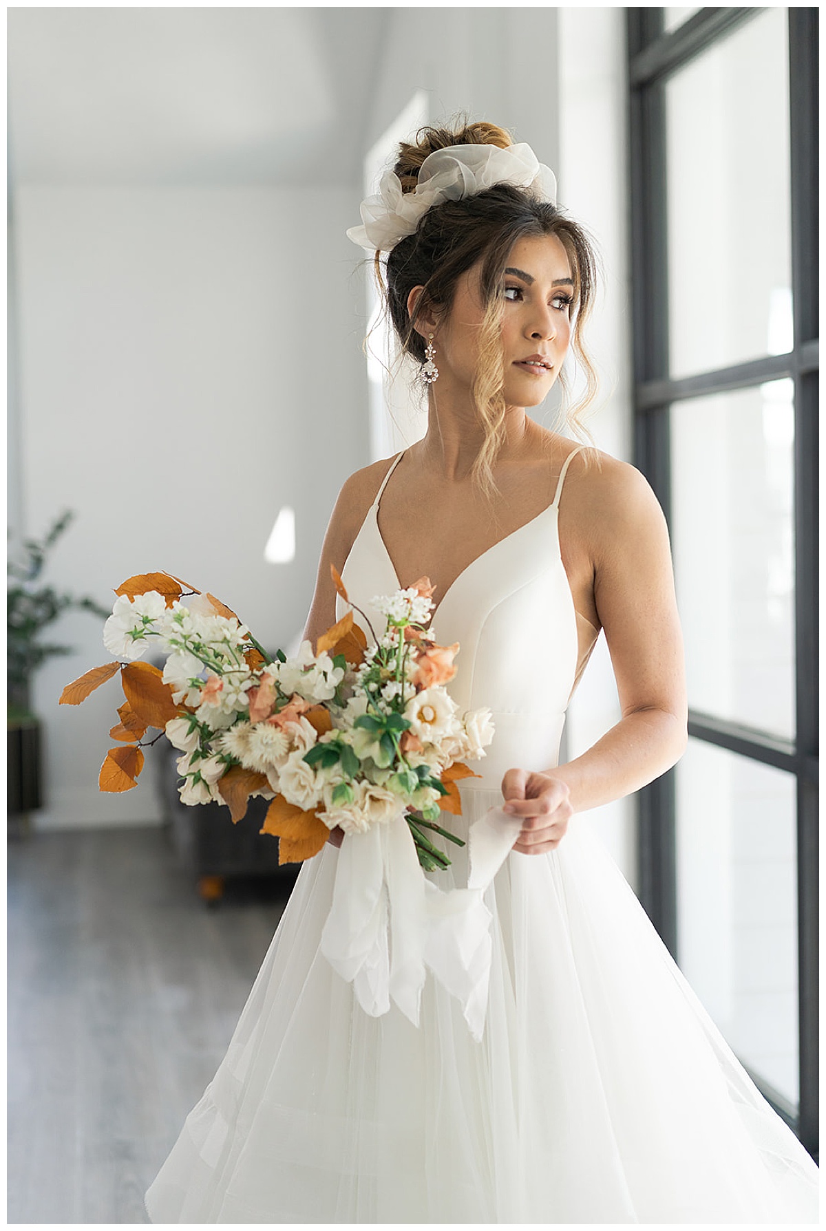 Stunning woman with gorgeous bridal bouquet at Boxwood Manor