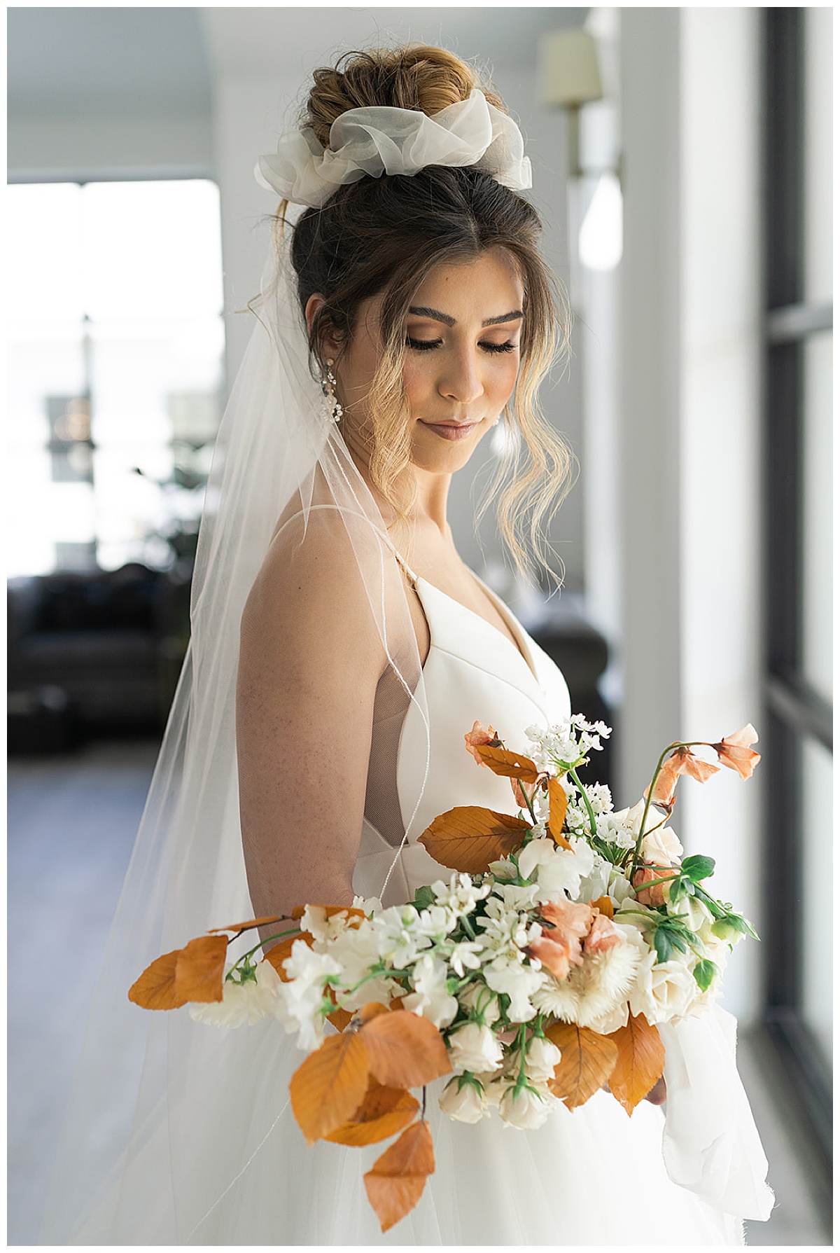 Stunning bride with florals by Houston’s Best Wedding Photographers 