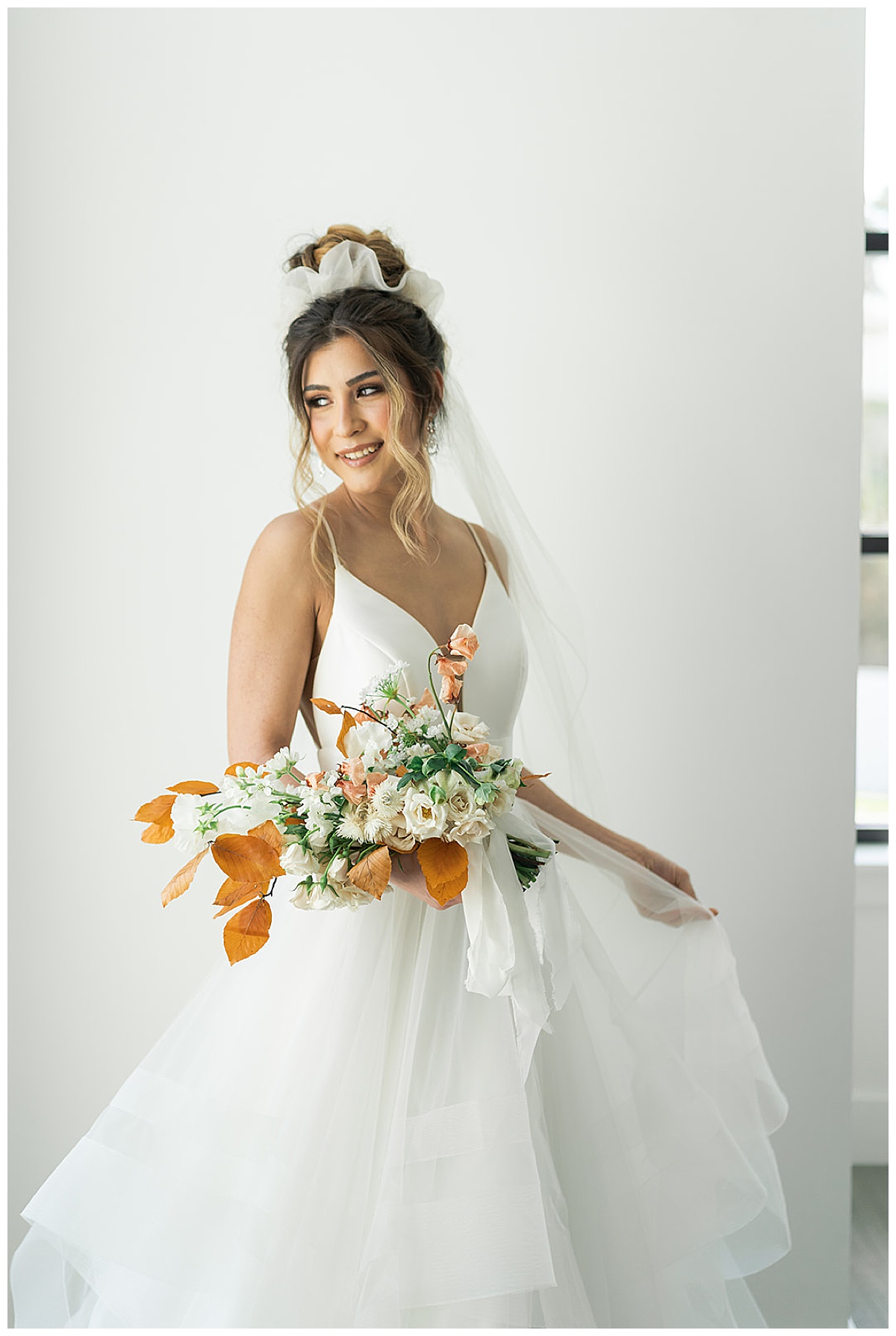 Stunning white bridal gown and bouquet for Houston’s Best Wedding Photographers 
