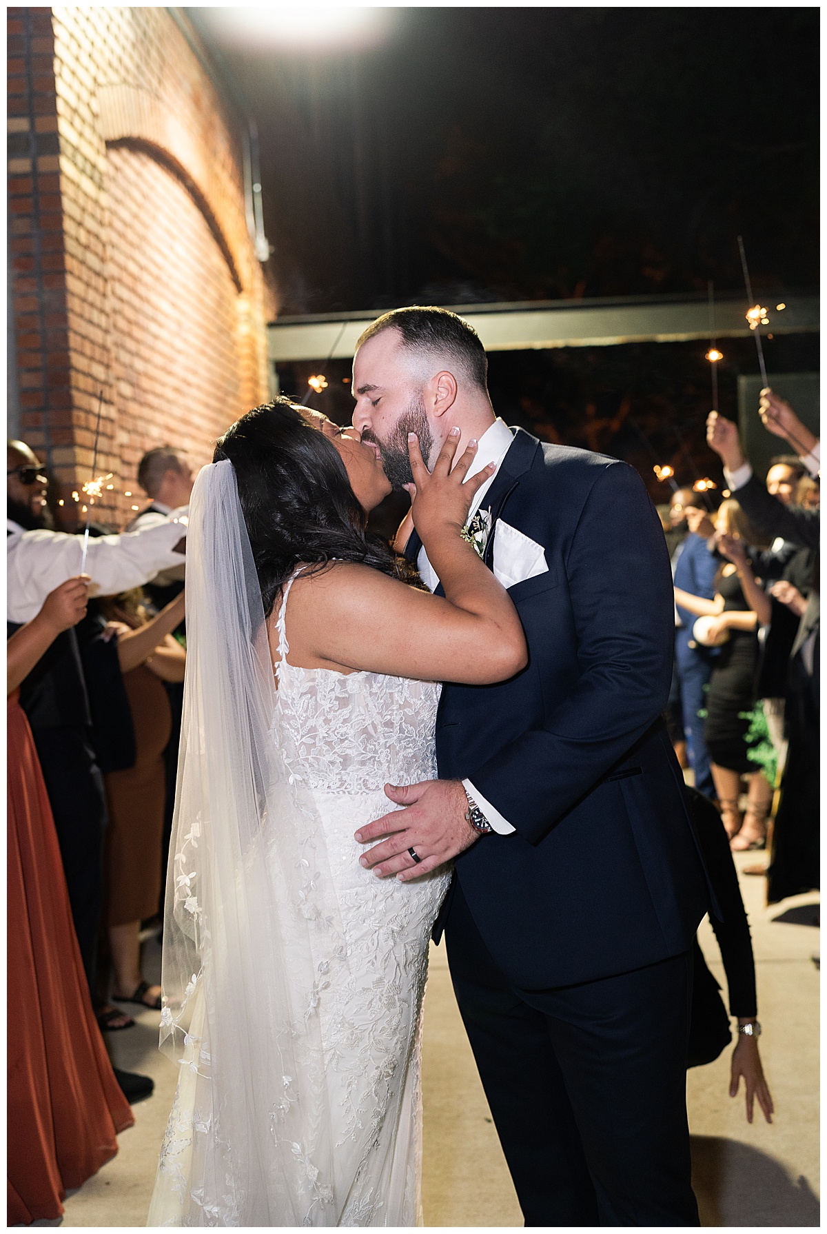 Married couple share a kiss for Houston’s Best Wedding Photographers