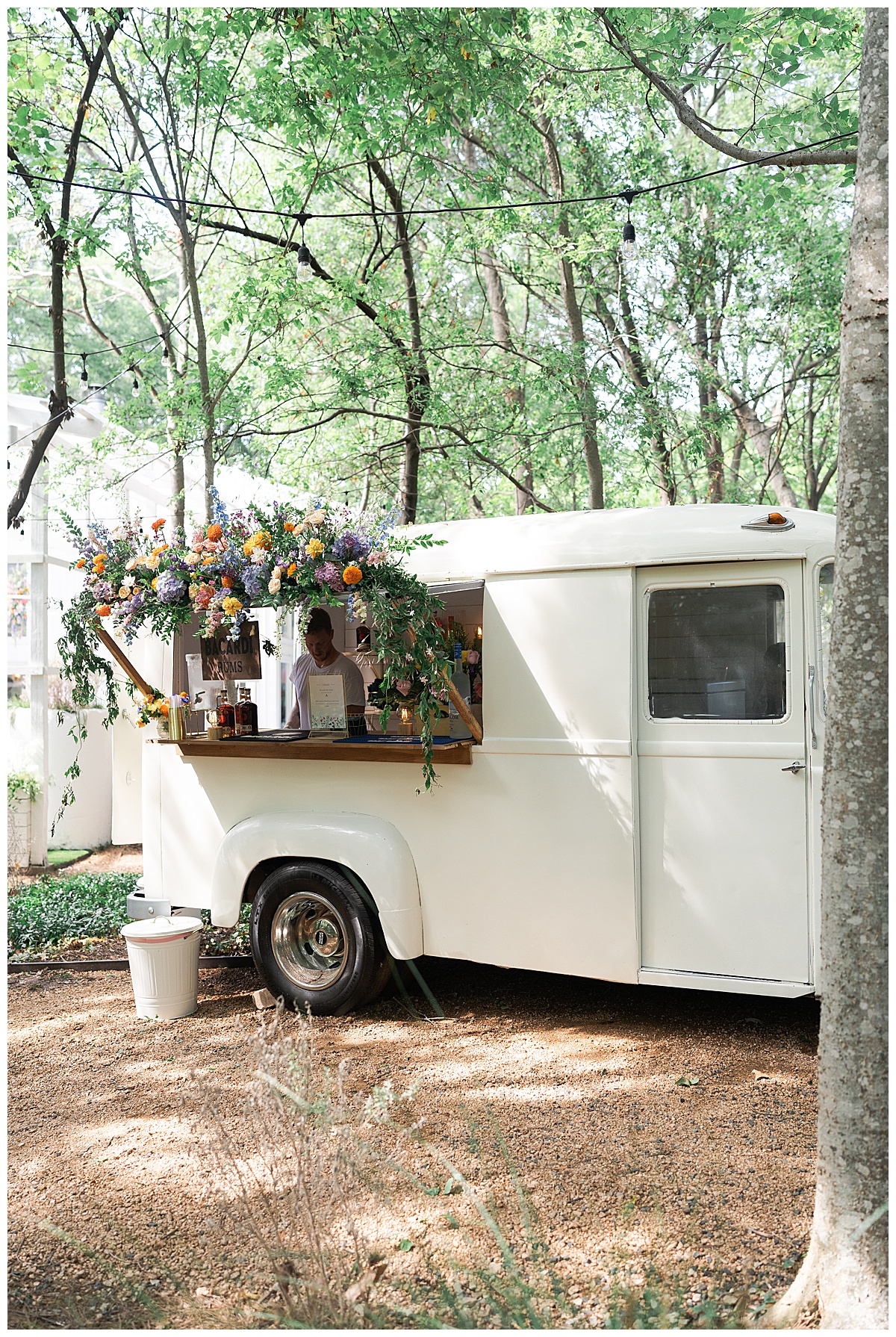 Small white truck with floral decor for the Open House at The Juliana