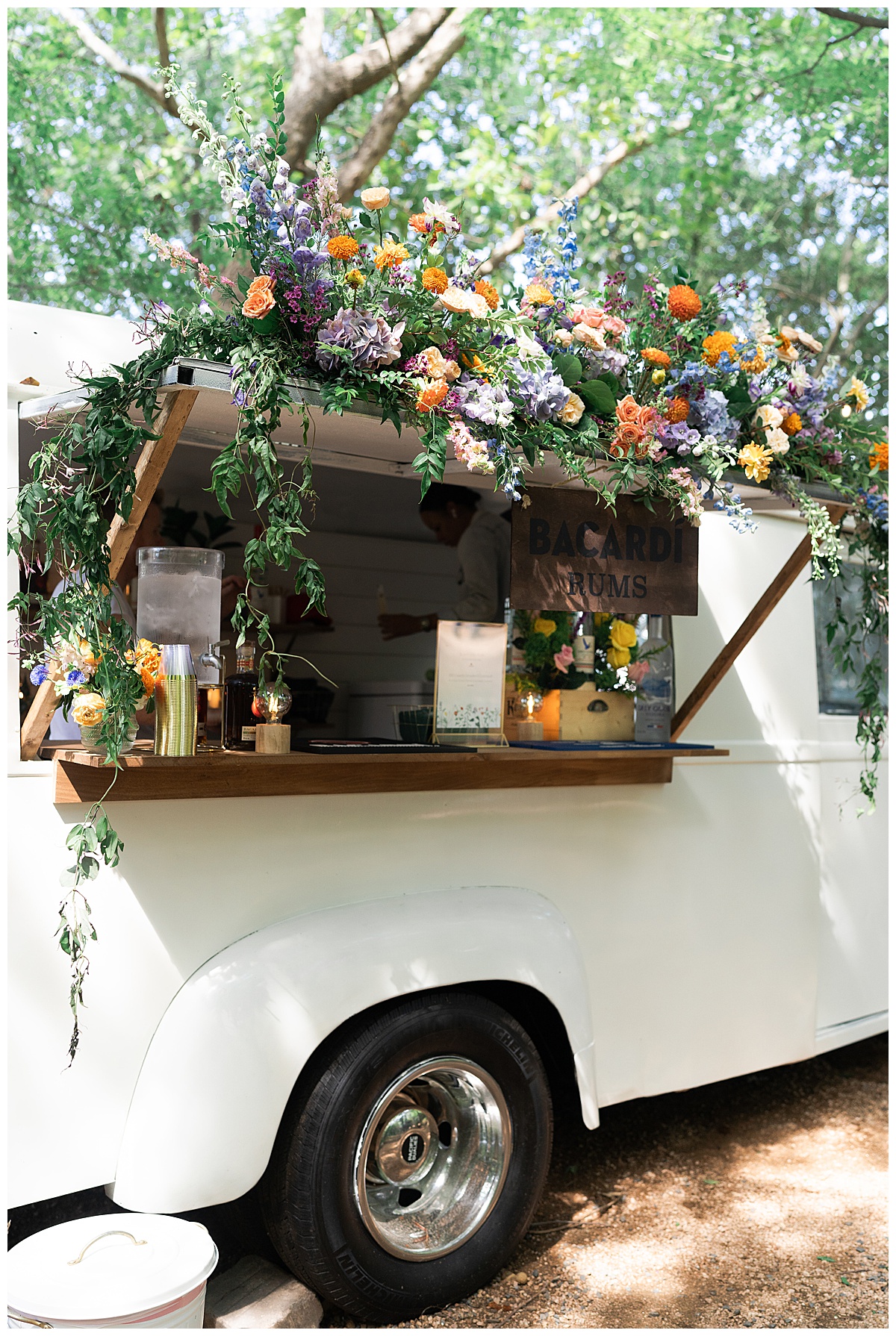 Floral installation on white truck for Houston’s Best Wedding Photographers
