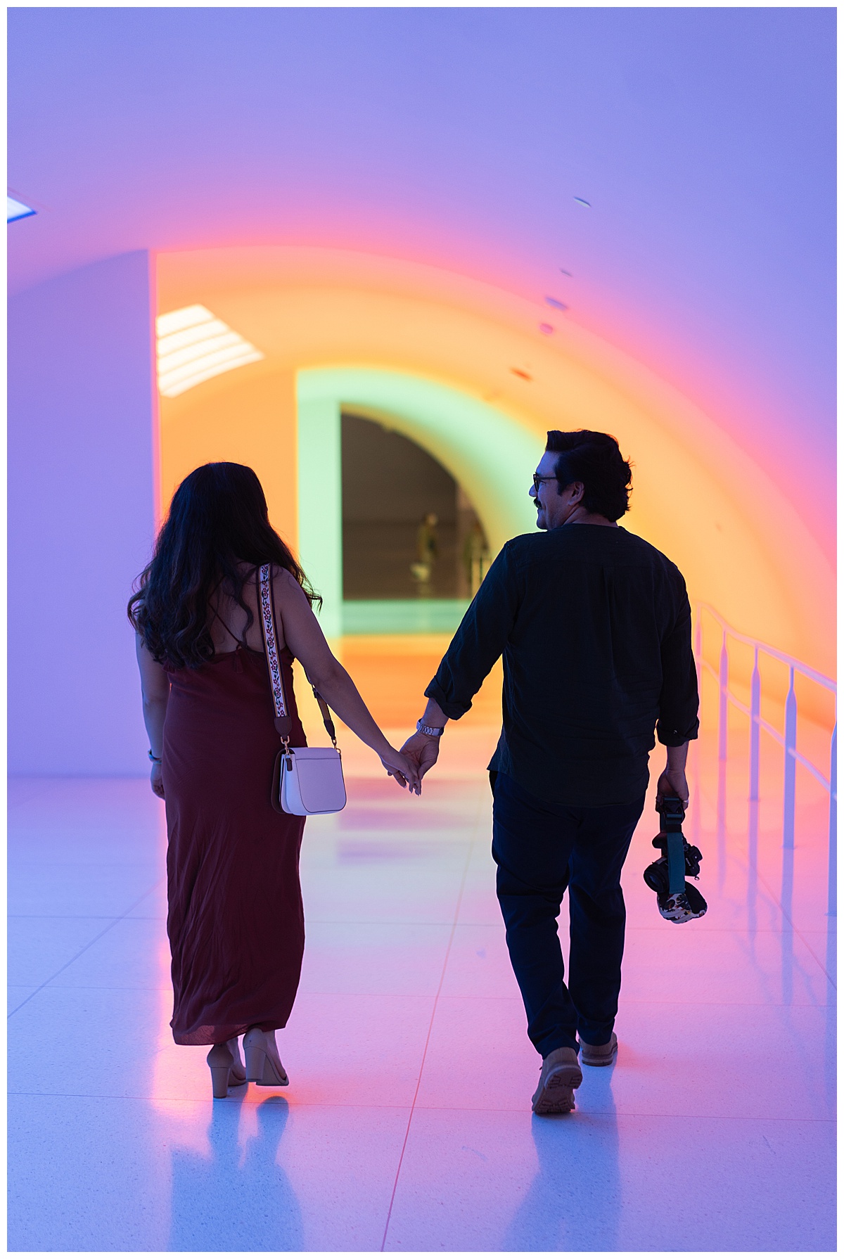 Two people walk hand in hand after Museum of Fine Arts Proposal