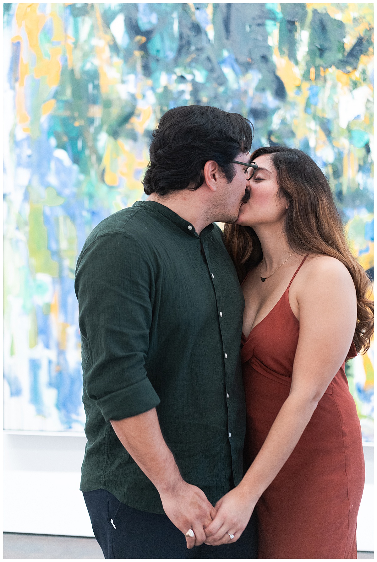 Man and woman share a kiss after Museum of Fine Arts Proposal 