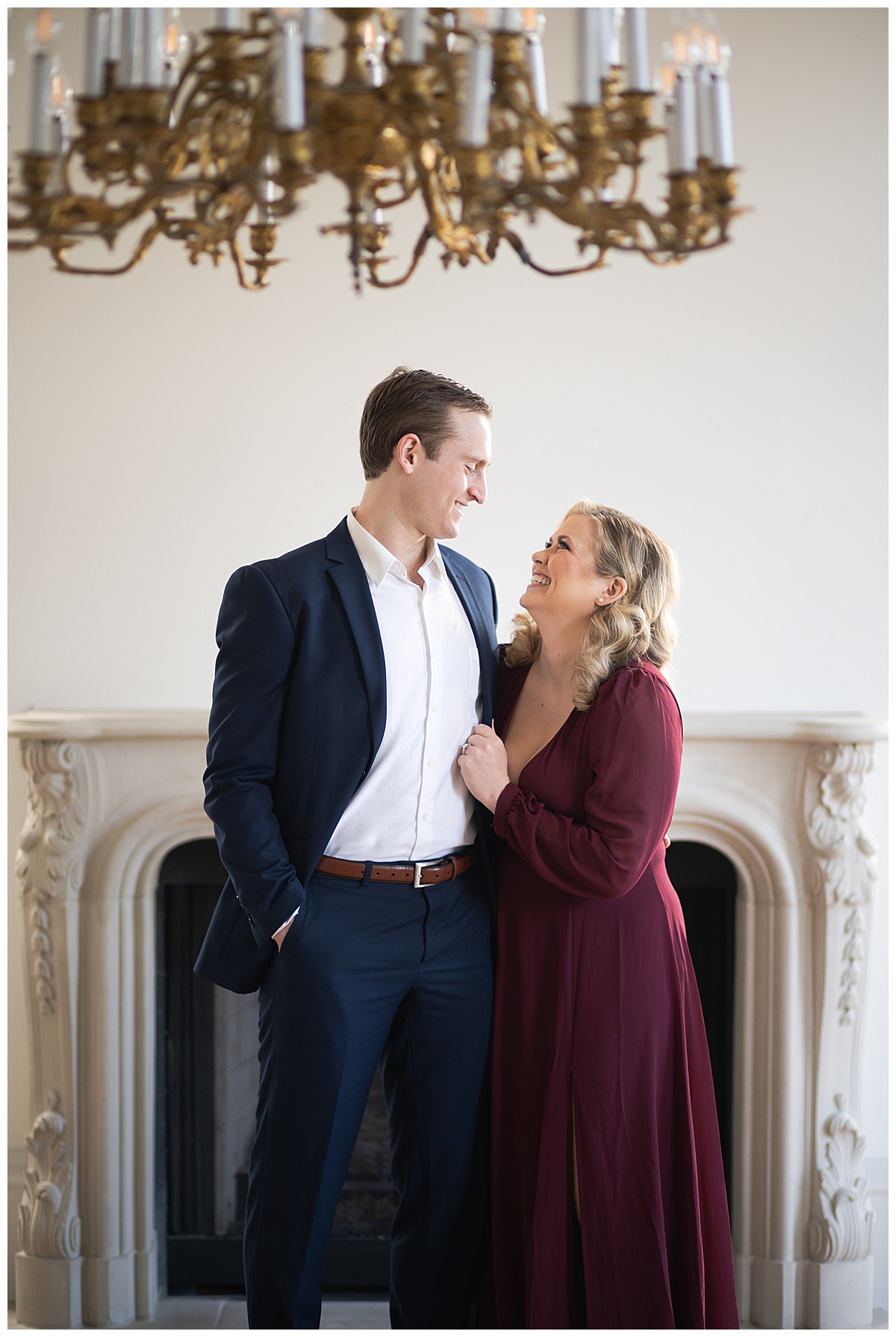 Lady looks at man for their Modern Romantic Engagement Session
