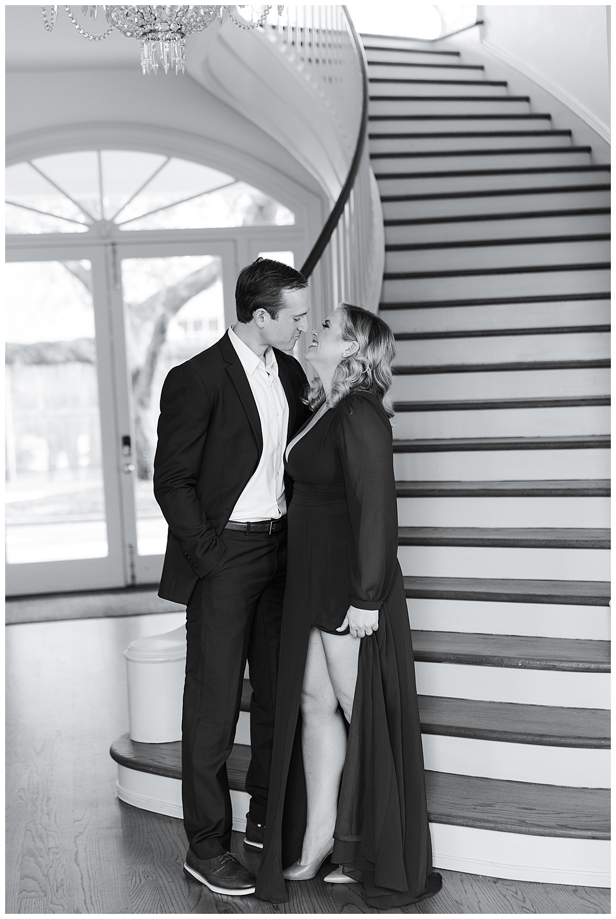 Man and woman stare into each others eyes near stairs for Houston’s Best Wedding Photographers
