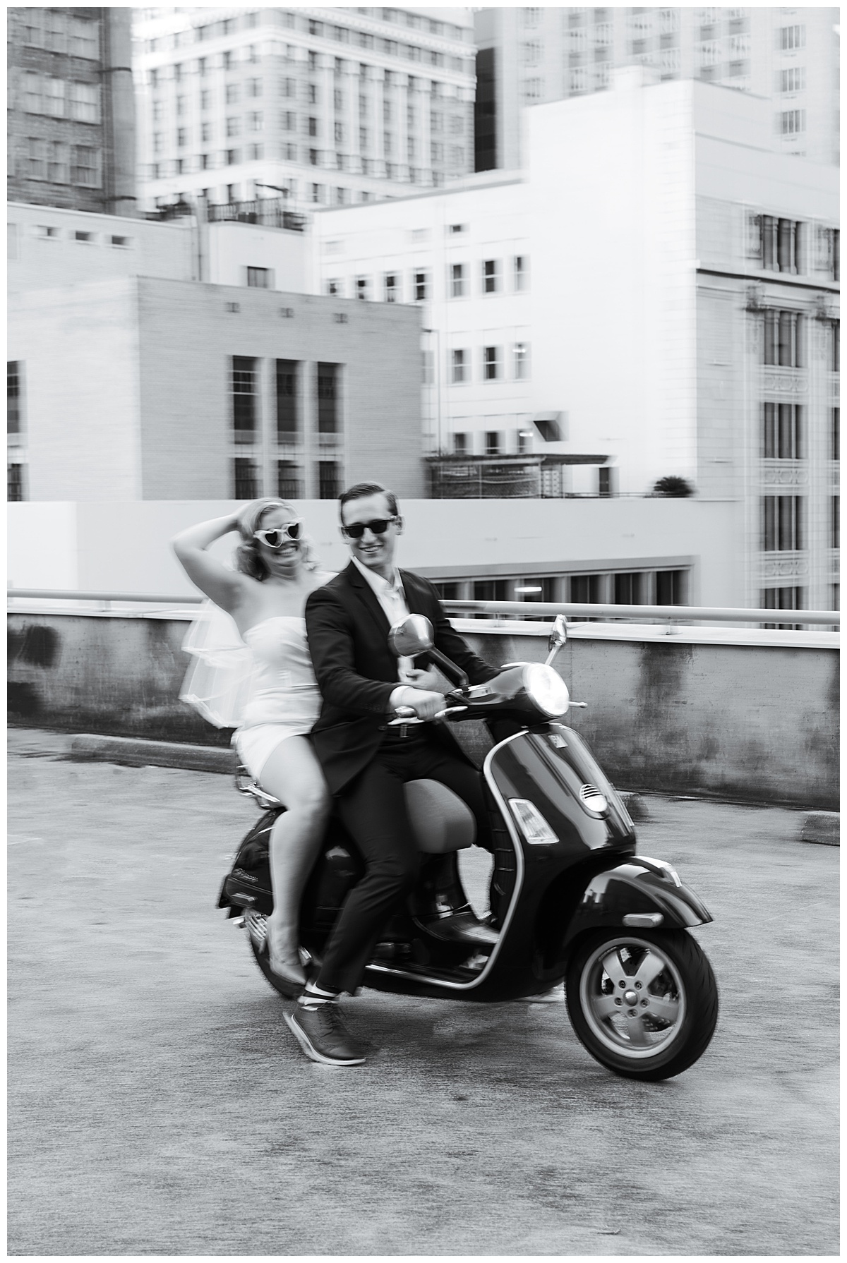 Man and woman enjoy Vespa ride for Swish & Click Photography