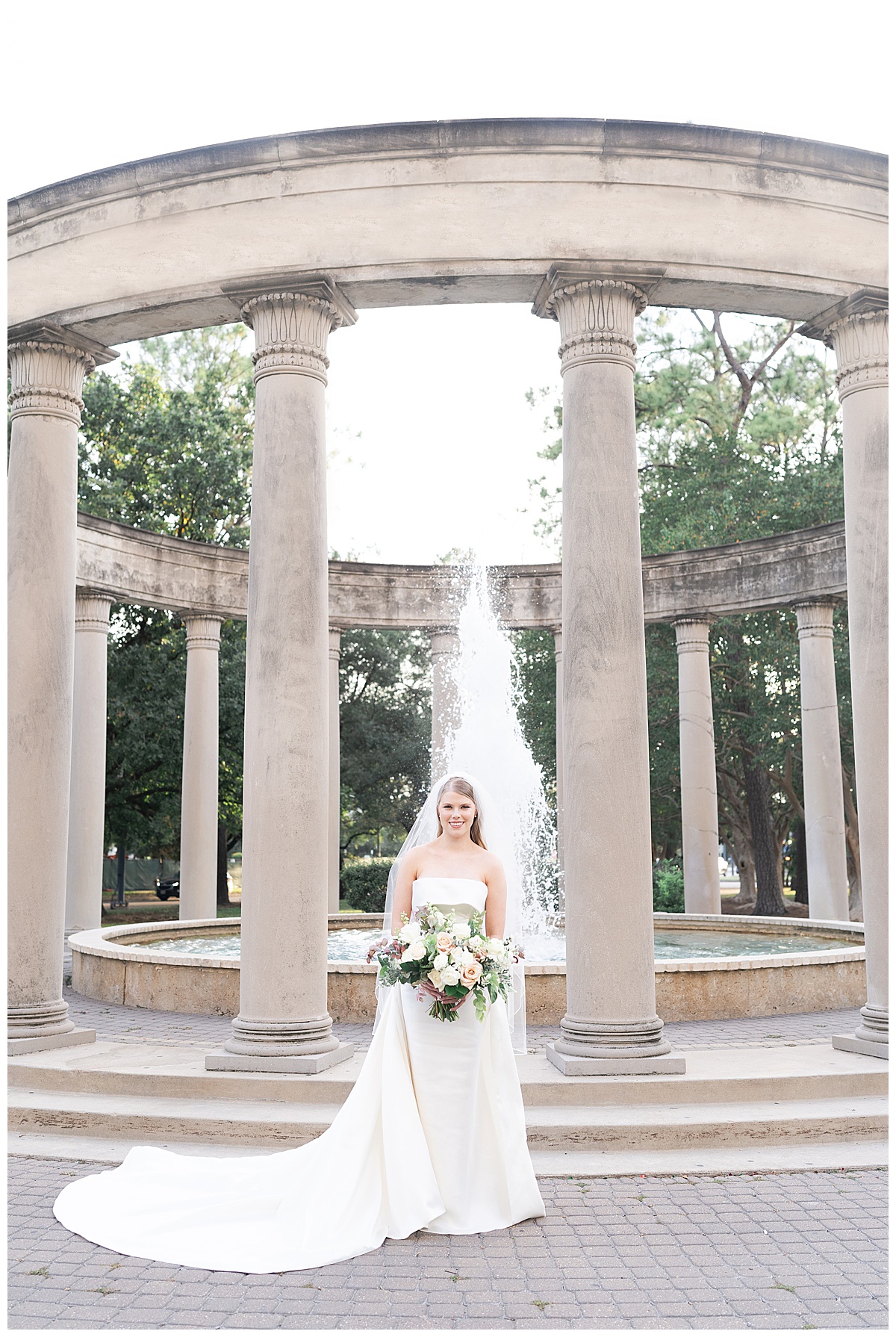 Woman stands in front of fountain after Stunning Bridal Portraits at The Creative Chateau