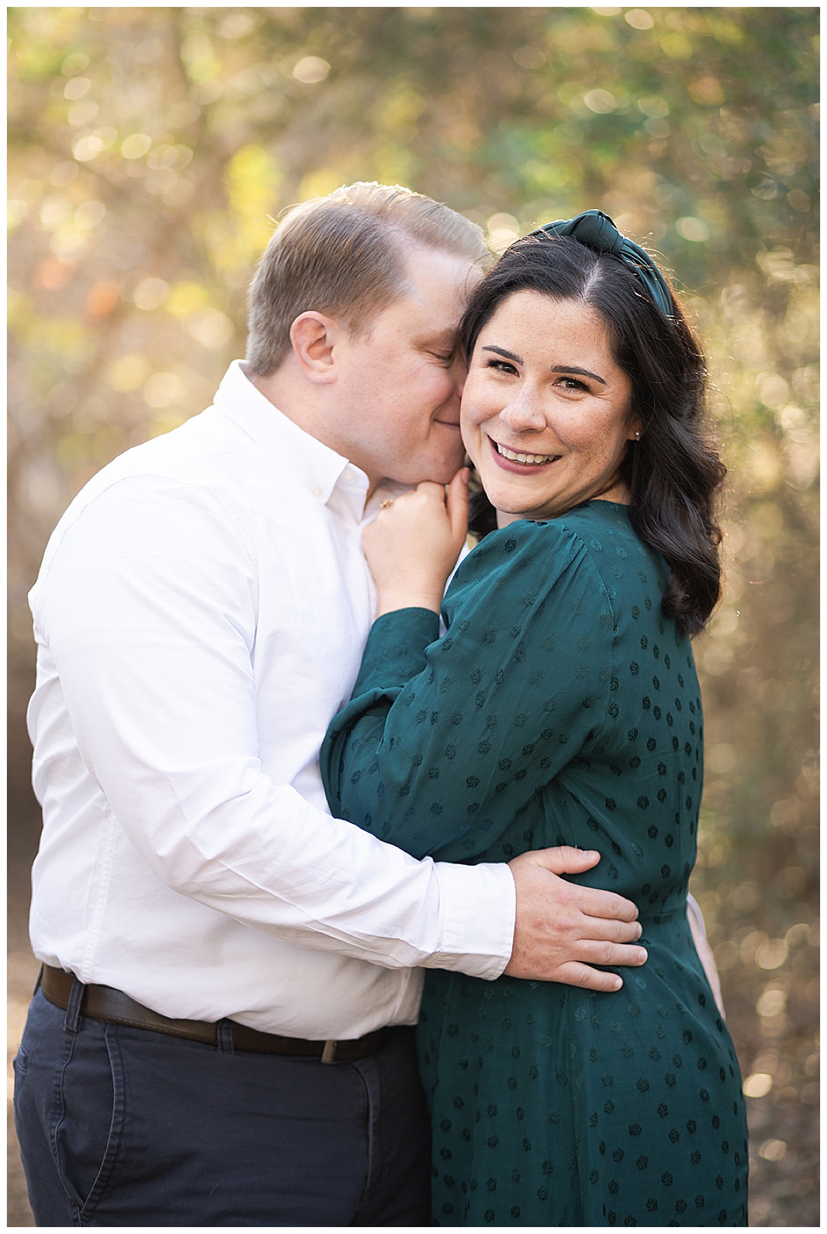 Couple hold one another close after Ninfa’s Engagement Session