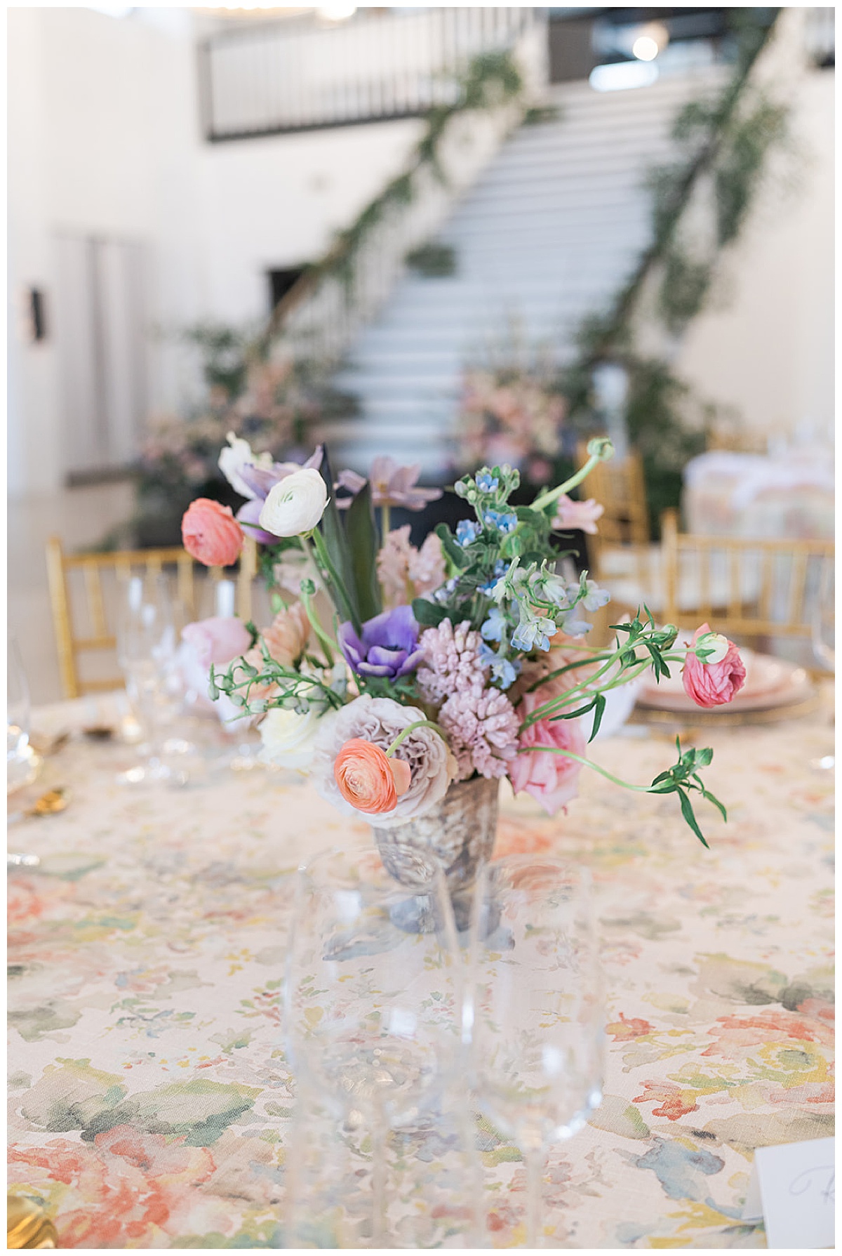 Spring flowers displayed as centerpieces for Houston’s Best Wedding Photographers