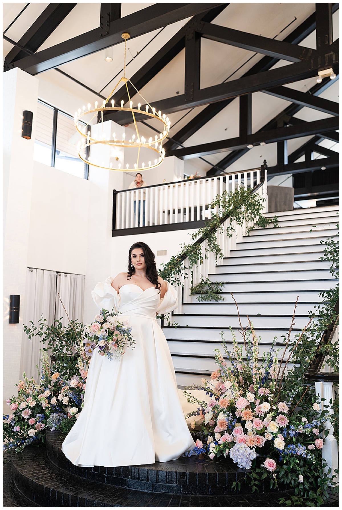 Stunning bride stands in front of grand staircase for Secret Garden Editorial