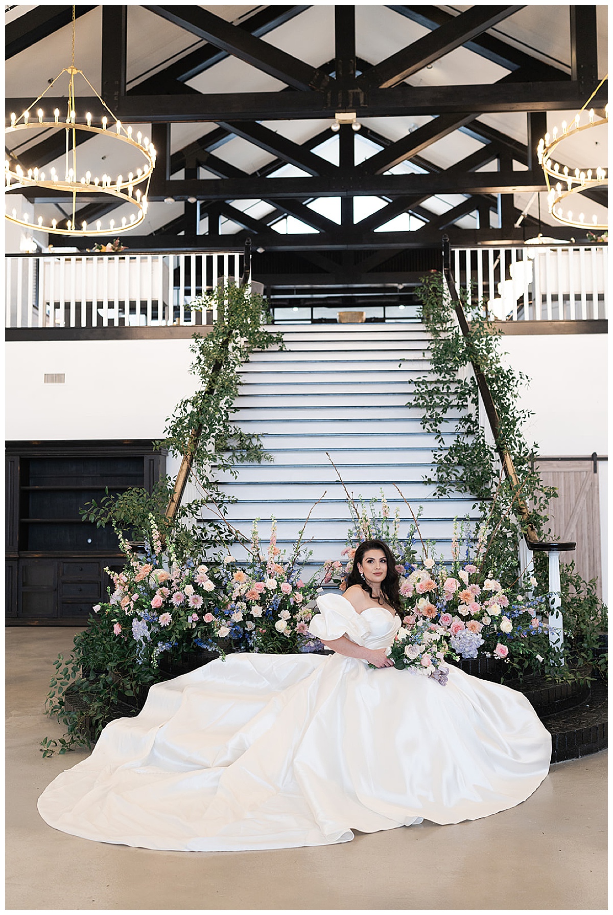 Stunning bride sits in front of staircase for Secret Garden Editorial