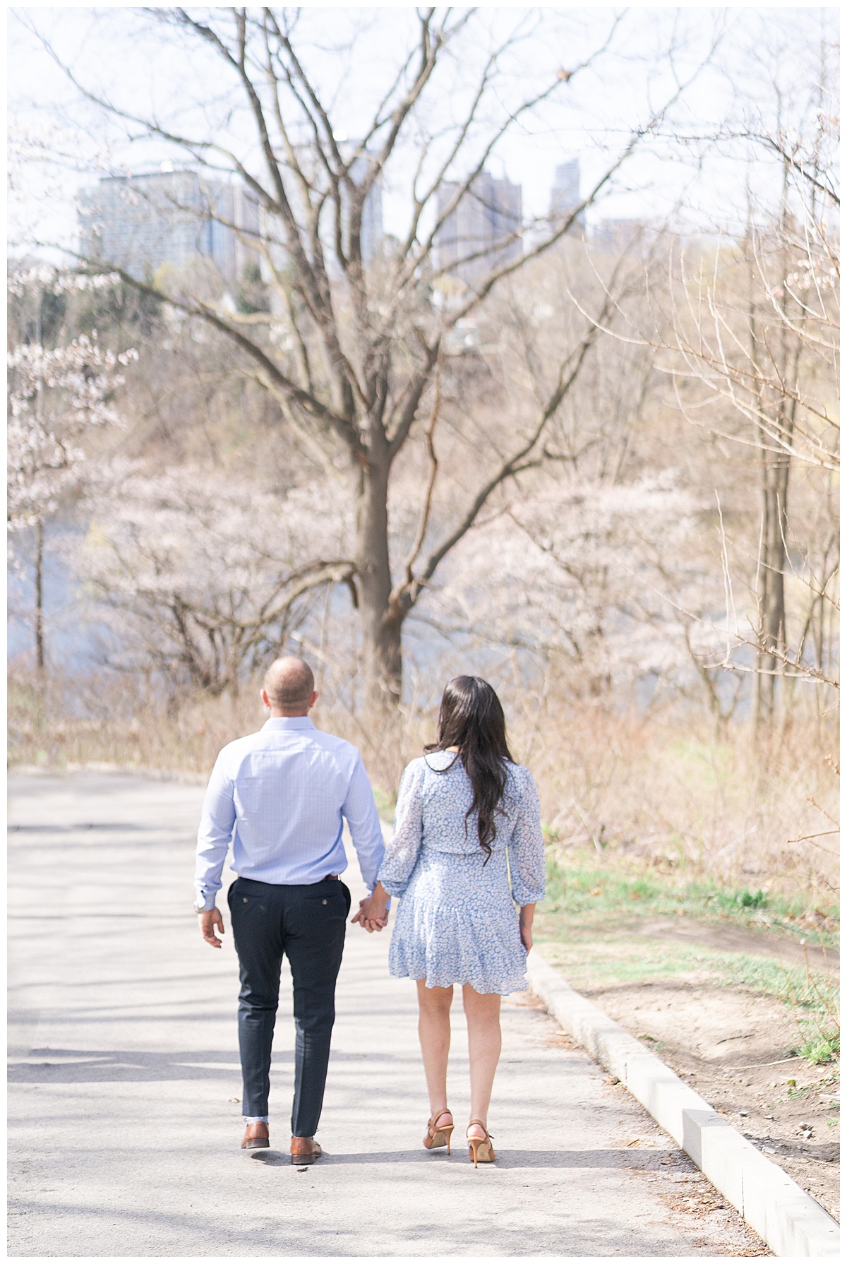 Guy and girl walk hand in hand for Toronto Wedding Photographer