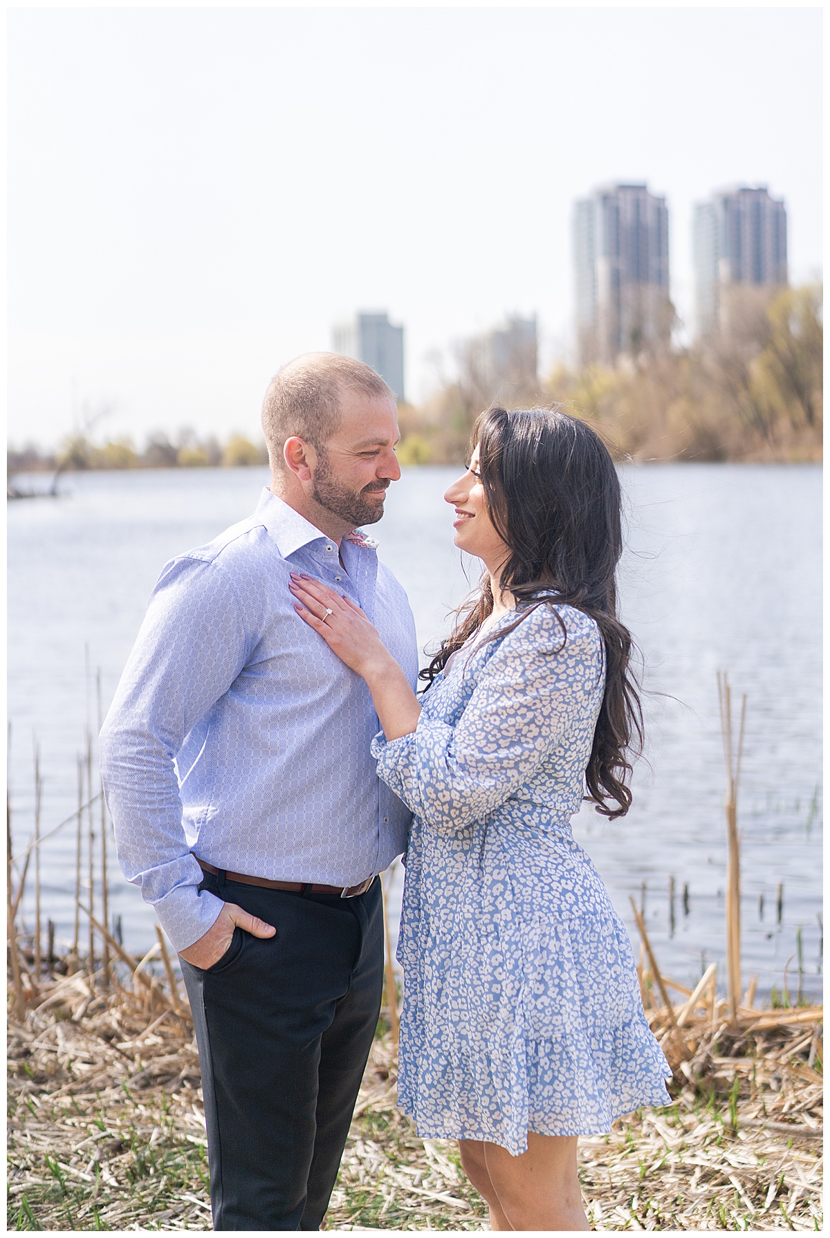 Lady holds hand on mans chest for Toronto Engagement Session