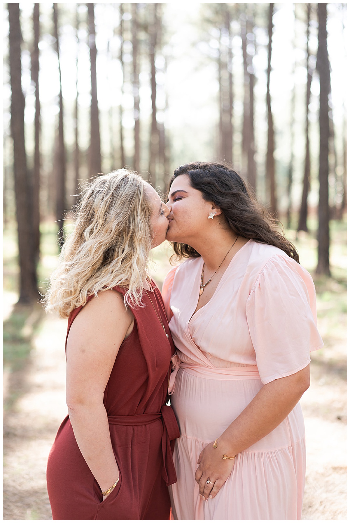 Two women share a passionate kiss for WG Jones Park Engagement Session 