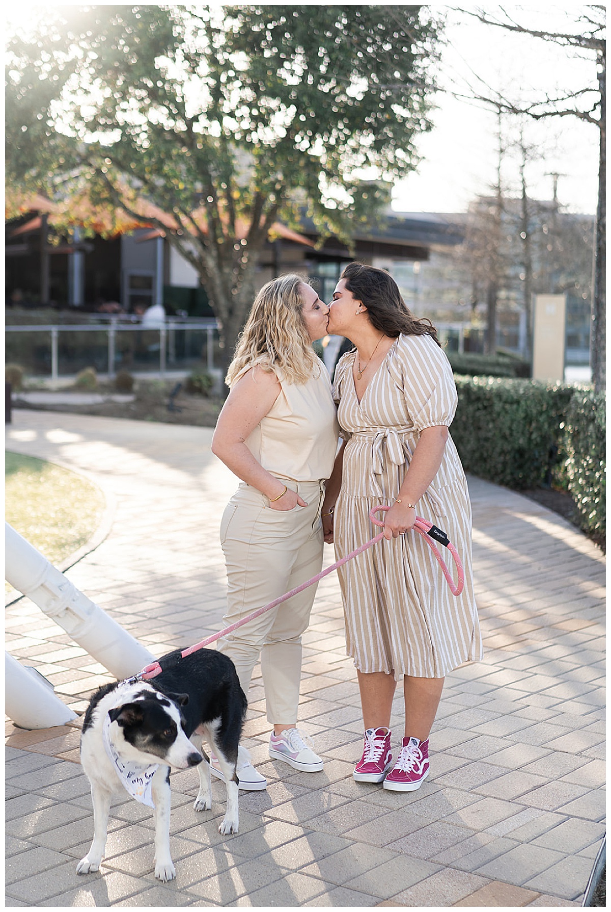 women share a kiss for Swish & Click Photography