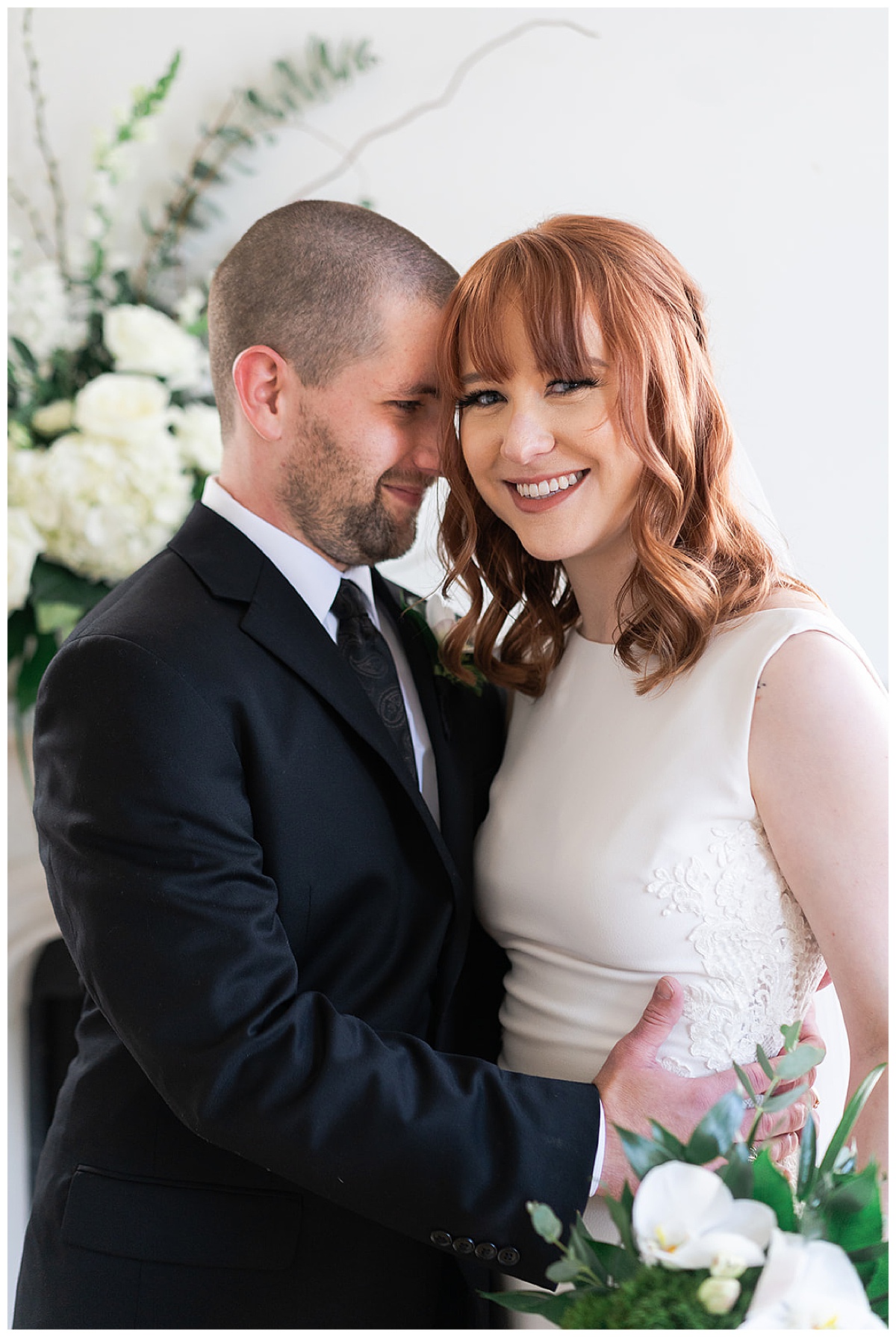 Groom rubs head against wife for Houston’s Best Wedding Photographers