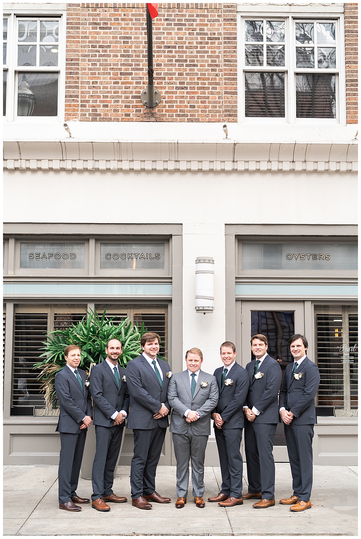 Groomsmen stand with groom for The Sam Houston Hotel