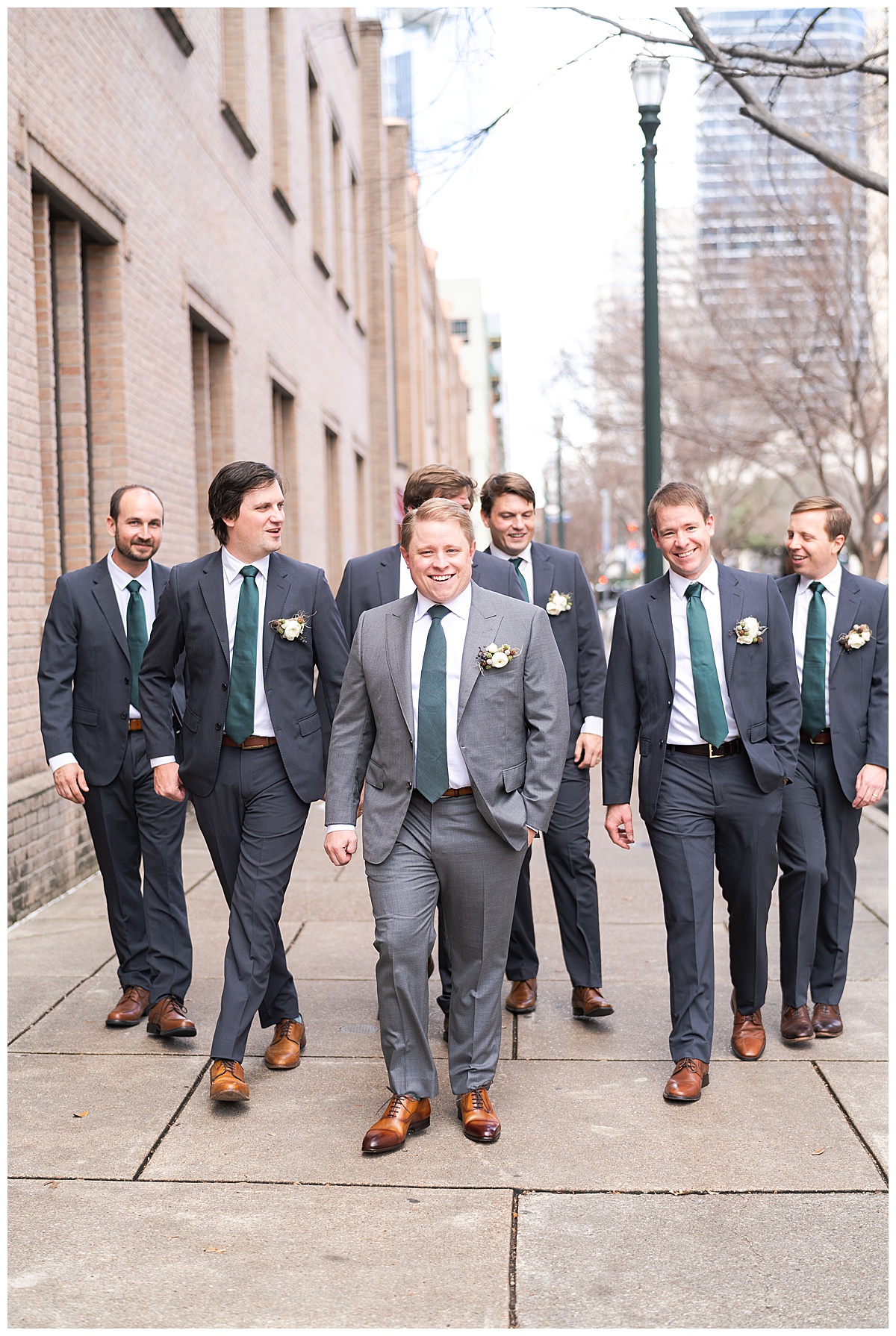 Groom walks with family and friends for Houston’s Best Wedding Photographers