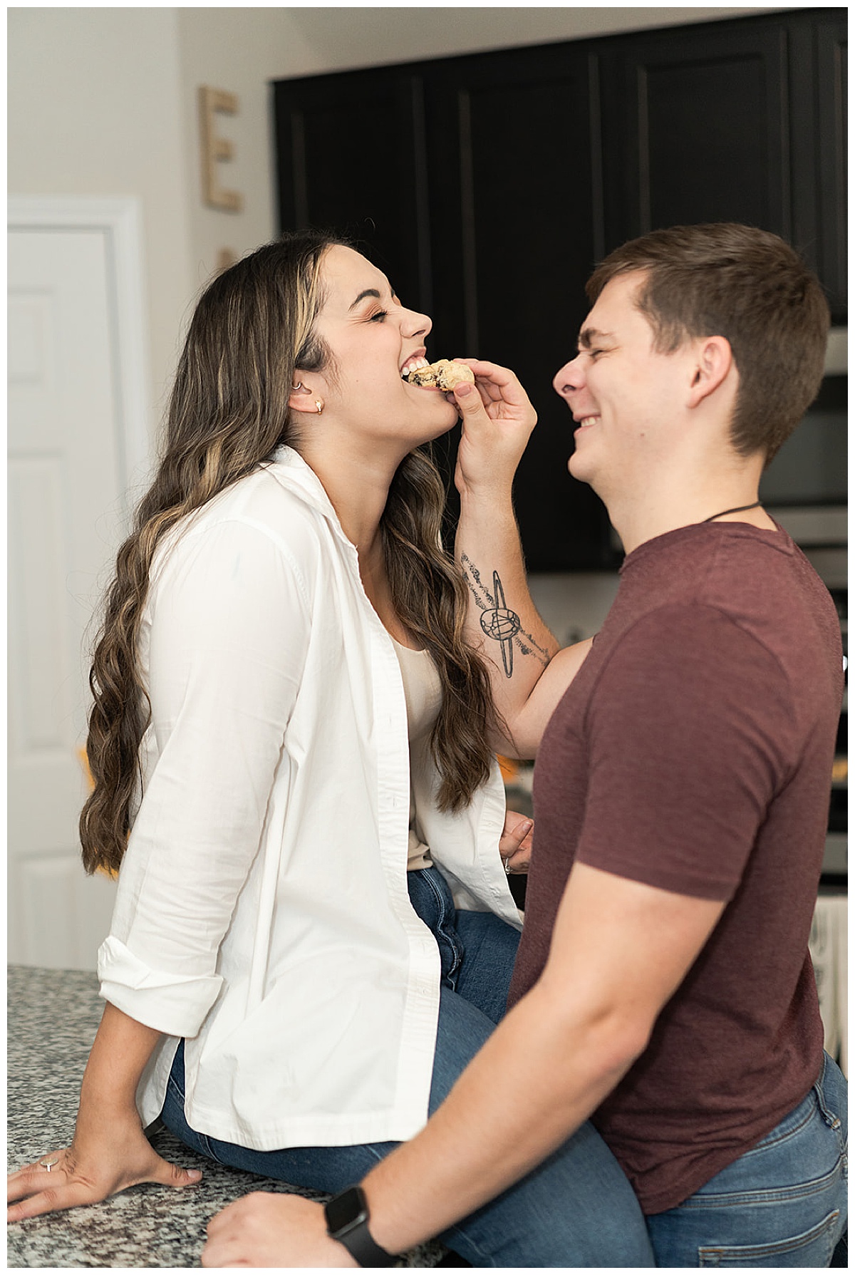 Man feeds woman a cookie for Houston’s Best Wedding Photographers