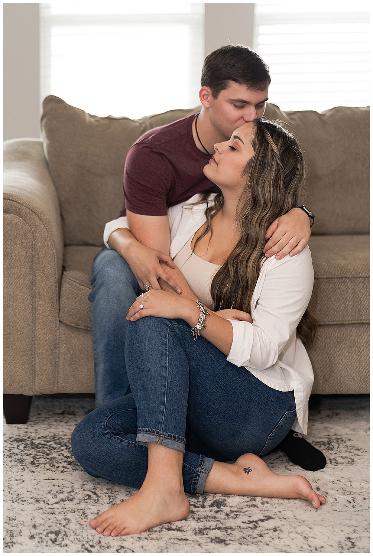 Man and woman share tender moments for At-Home Engagement Photos