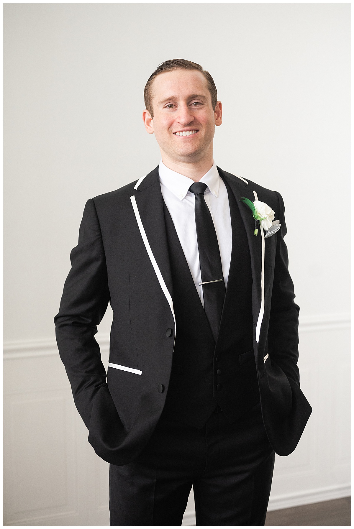 Groom gets ready for wedding for Swish & Click Photography