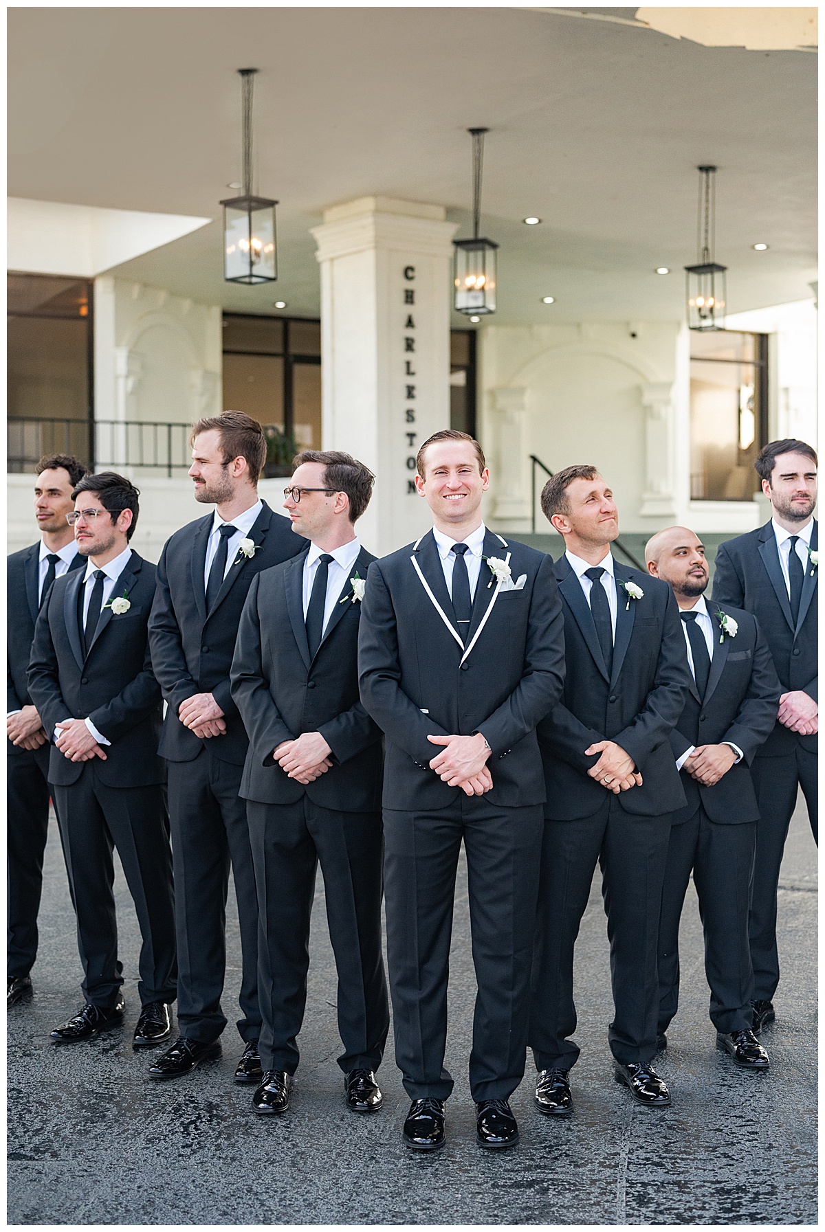 Groom stands with groomsmen for Houston’s Best Wedding Photographers