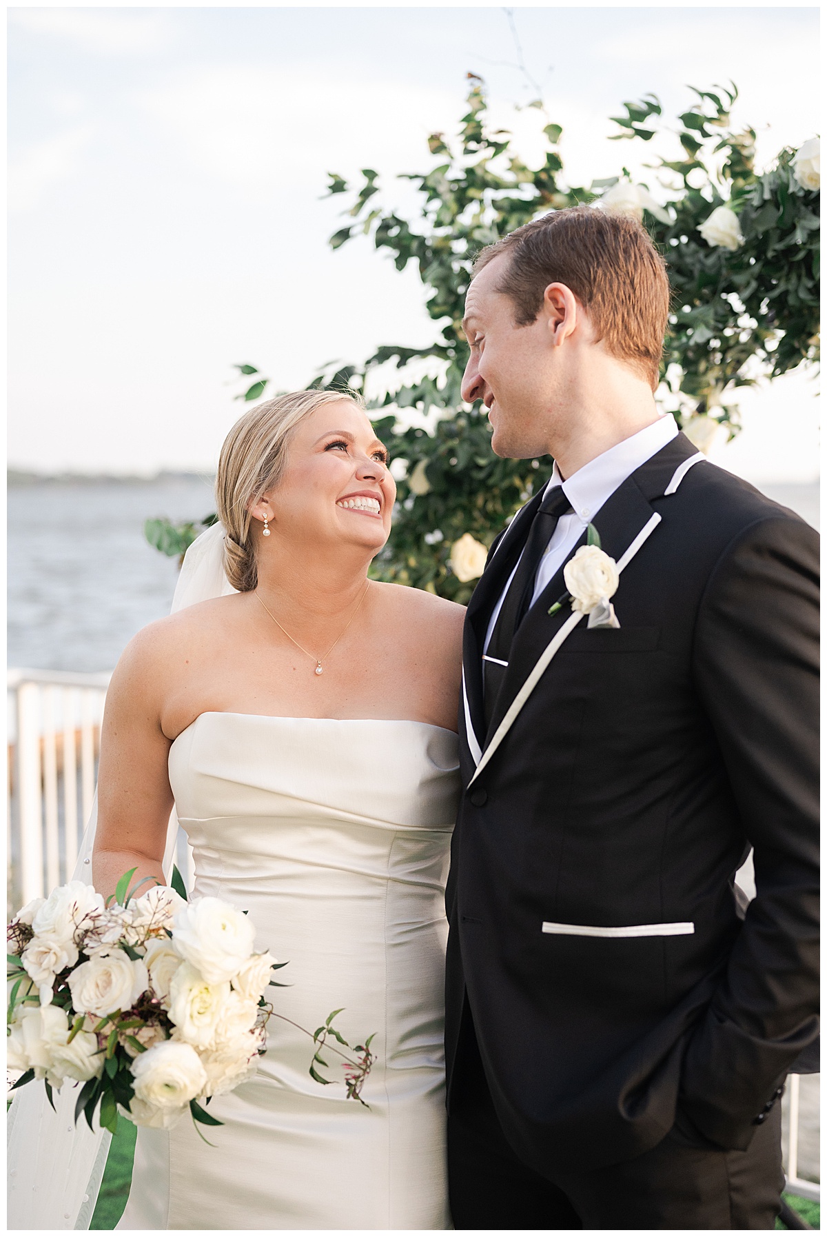 Bride and groom smile at one another at Charleston Lane 