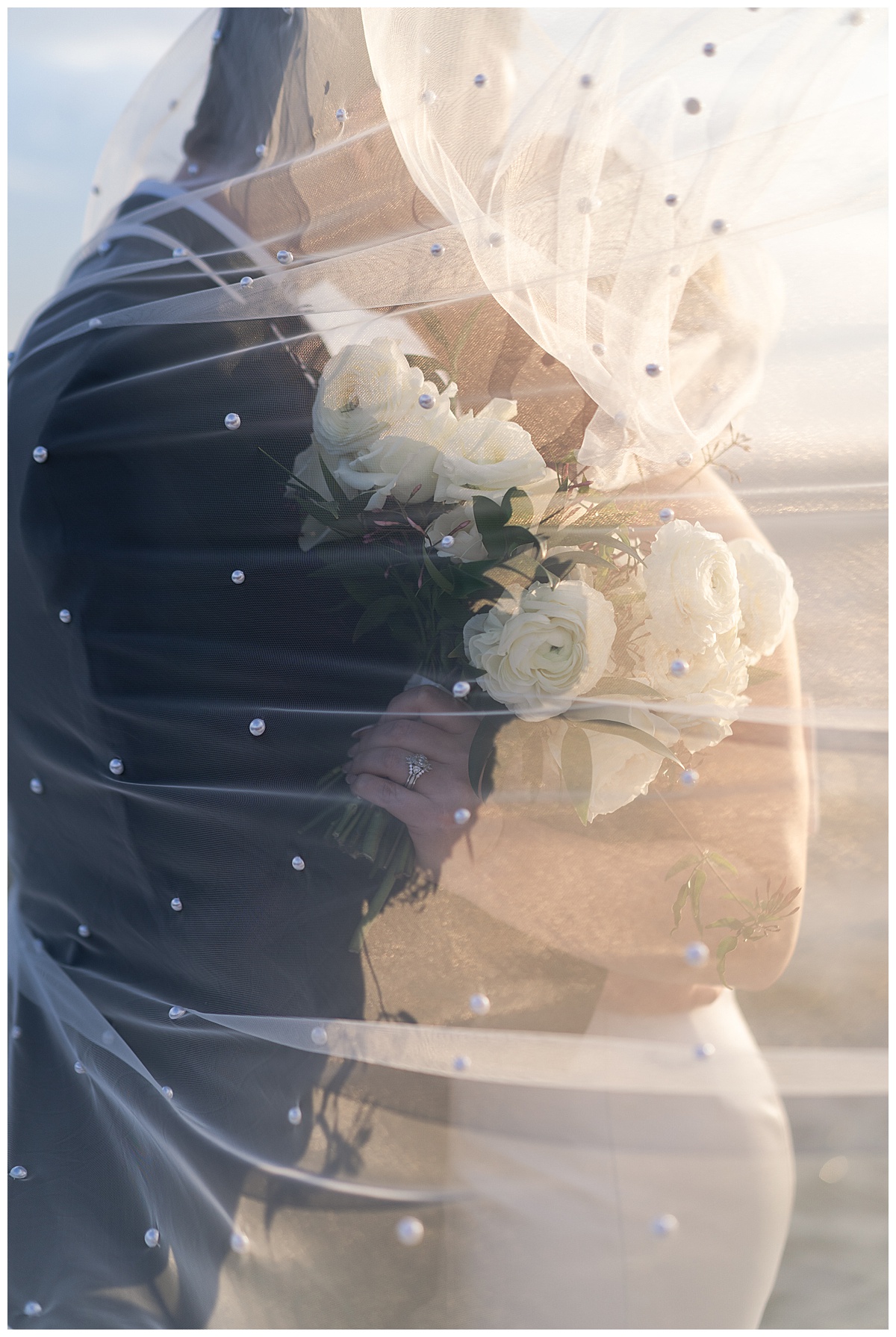 Married couple share a kiss under a veil Houston’s Best Wedding Photographers