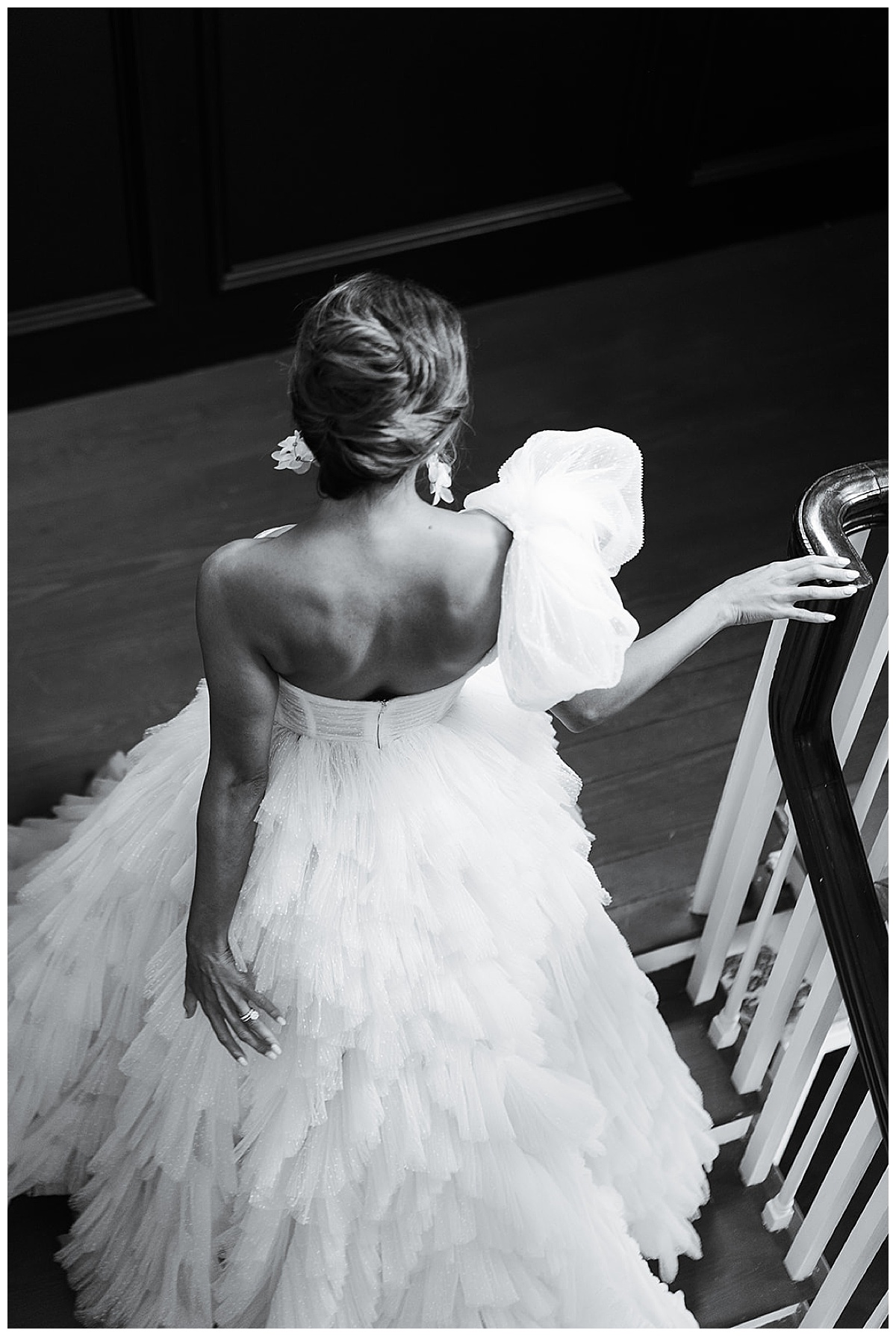 Bride walks down the stairs for Editorial at The Mason