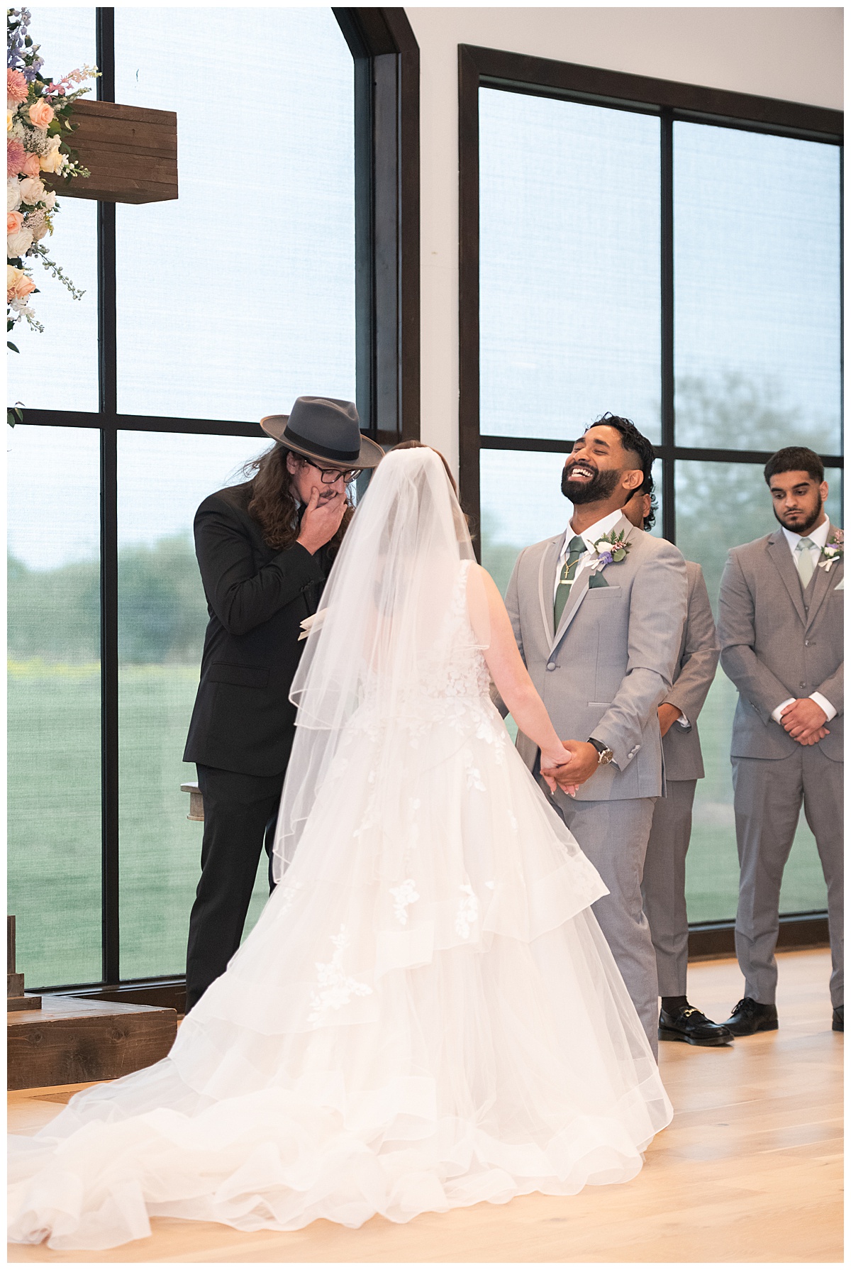 Groom smiles big during ceremony for Houston’s Best Wedding Photographers 