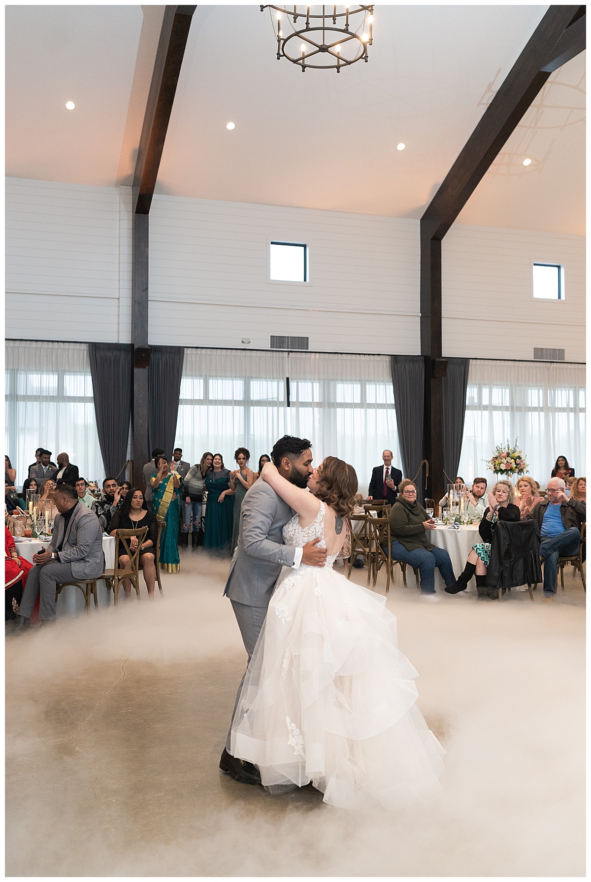 husband and wife dance together at Deep in the Heart Farms