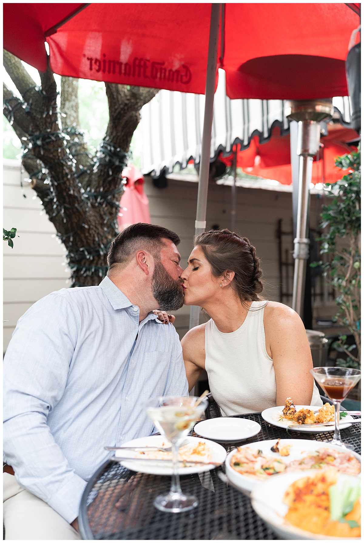 Couple share a kiss for Downtown Houston Engagement Session